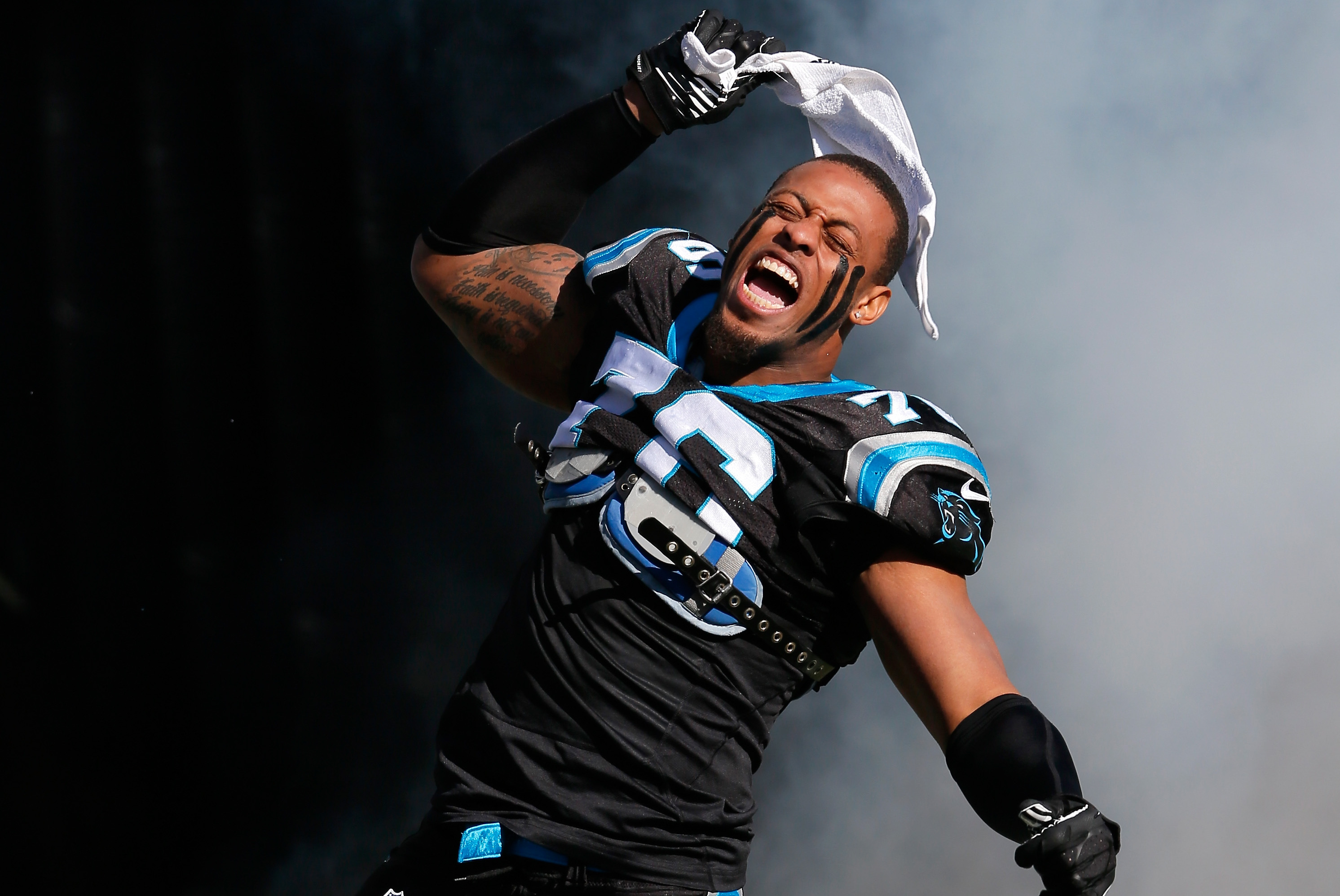 CHARLOTTE, NC - JANUARY 12: Greg Hardy #76 of the Carolina Panthers runs onto the field during player introductions against the San Francisco 49ers during the NFC Divisional Playoff Game at Bank of America Stadium on January 12, 2014 in Charlotte, North Carolina.  (Photo by Kevin C. Cox/Getty Images)