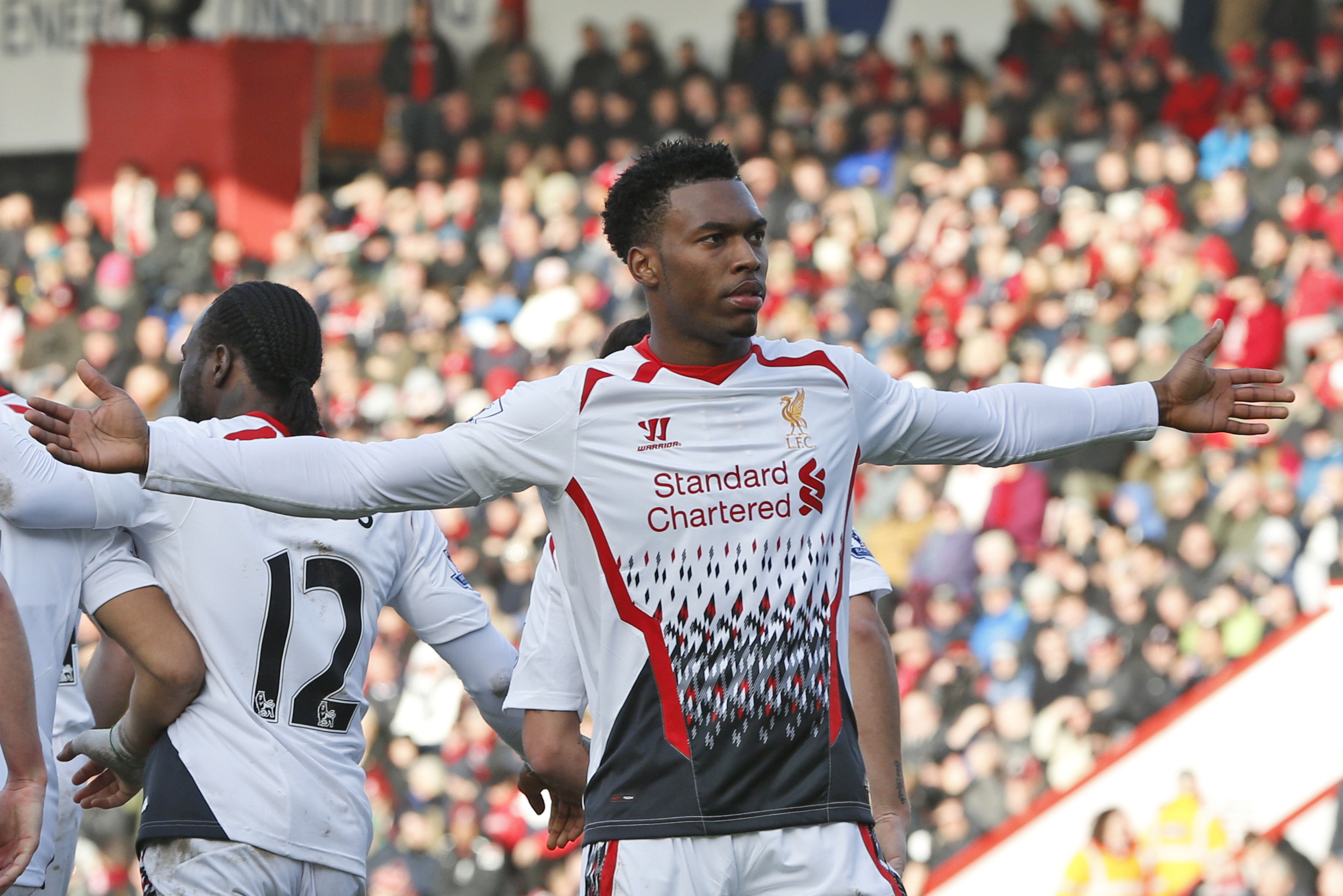 Liverpool's Daniel Sturridge celebrates his goal against AFC Bournemouth during their English FA Cup 4th round soccer match in Bournemouth, south England, Saturday, Jan. 25, 2014. Liverpool won the match 2-0.(AP Photo/Lefteris Pitarakis)