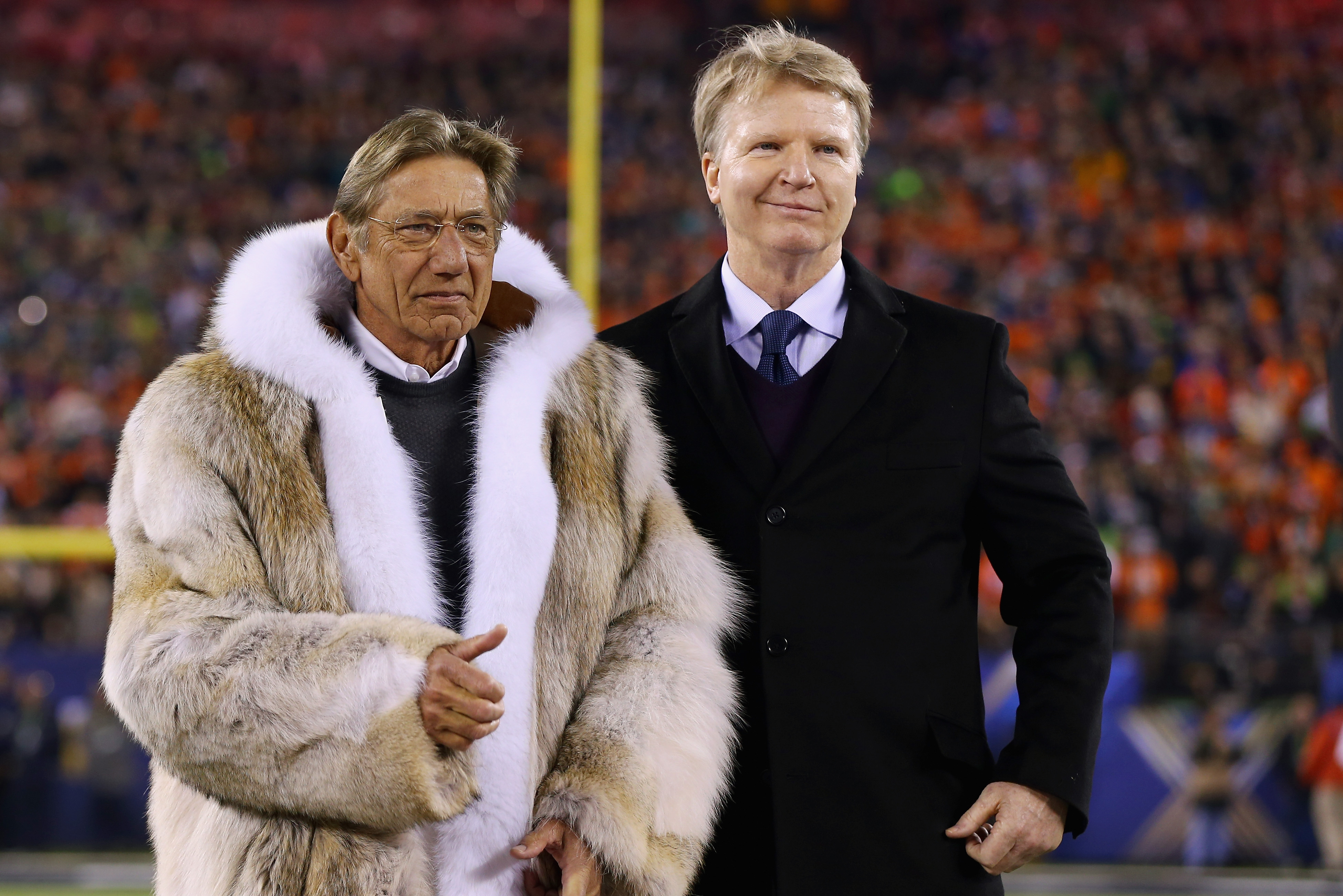 EAST RUTHERFORD, NJ - FEBRUARY 02:  Joe Namath talks with Phil Simms prior to start of Super Bowl XLVIII between the Denver Broncos and the Seattle Seahawks  at MetLife Stadium on February 2, 2014 in East Rutherford, New Jersey.  (Photo by Elsa/Getty Images)