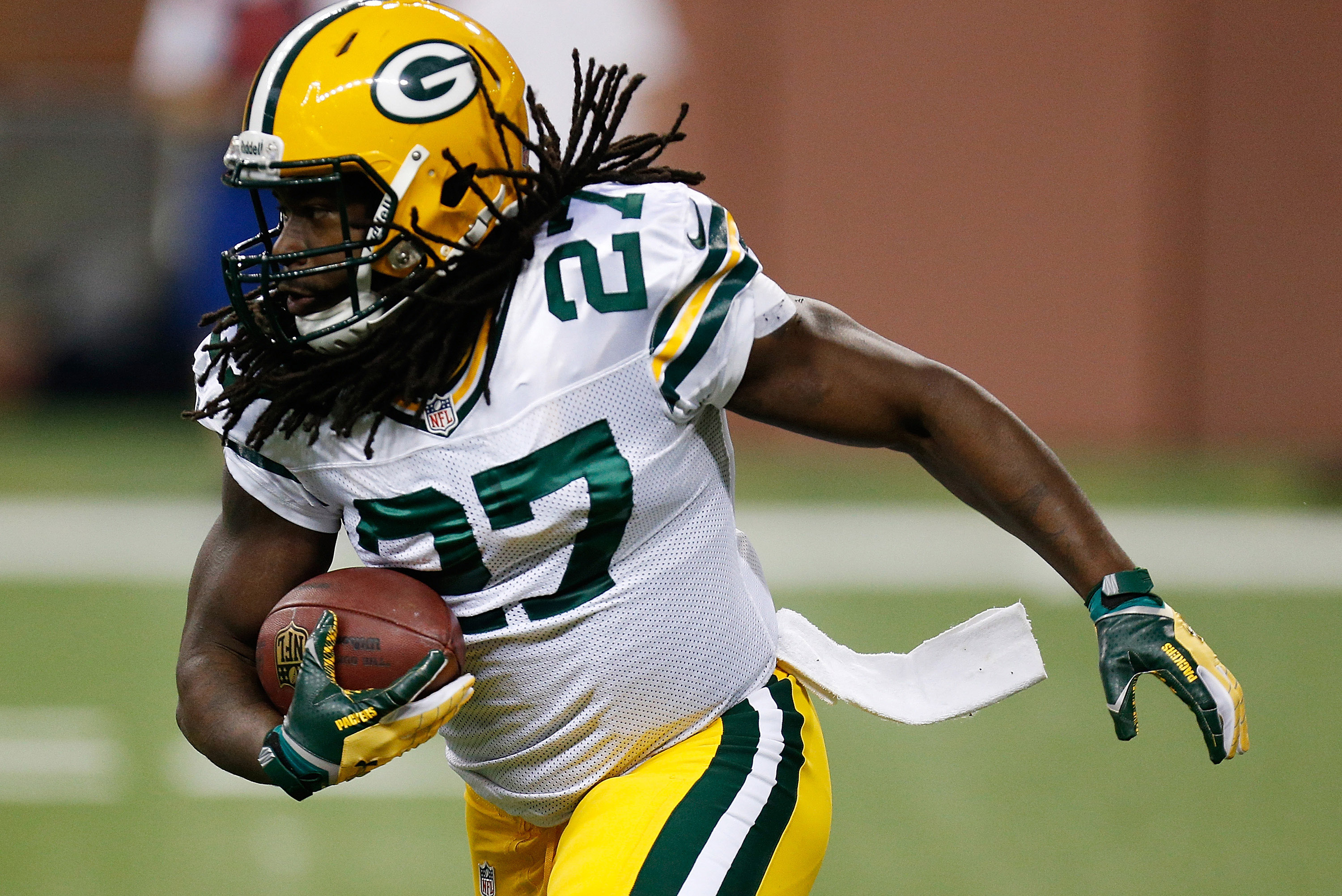 DETROIT, MI - NOVEMBER 28: Eddie Lacy #27 of the Green Bay Packers looks for an opening during a first quarter run while playing the Detroit Lions at Ford Field on November 28, 2013 in Detroit, Michigan. (Photo by Gregory Shamus/Getty Images)