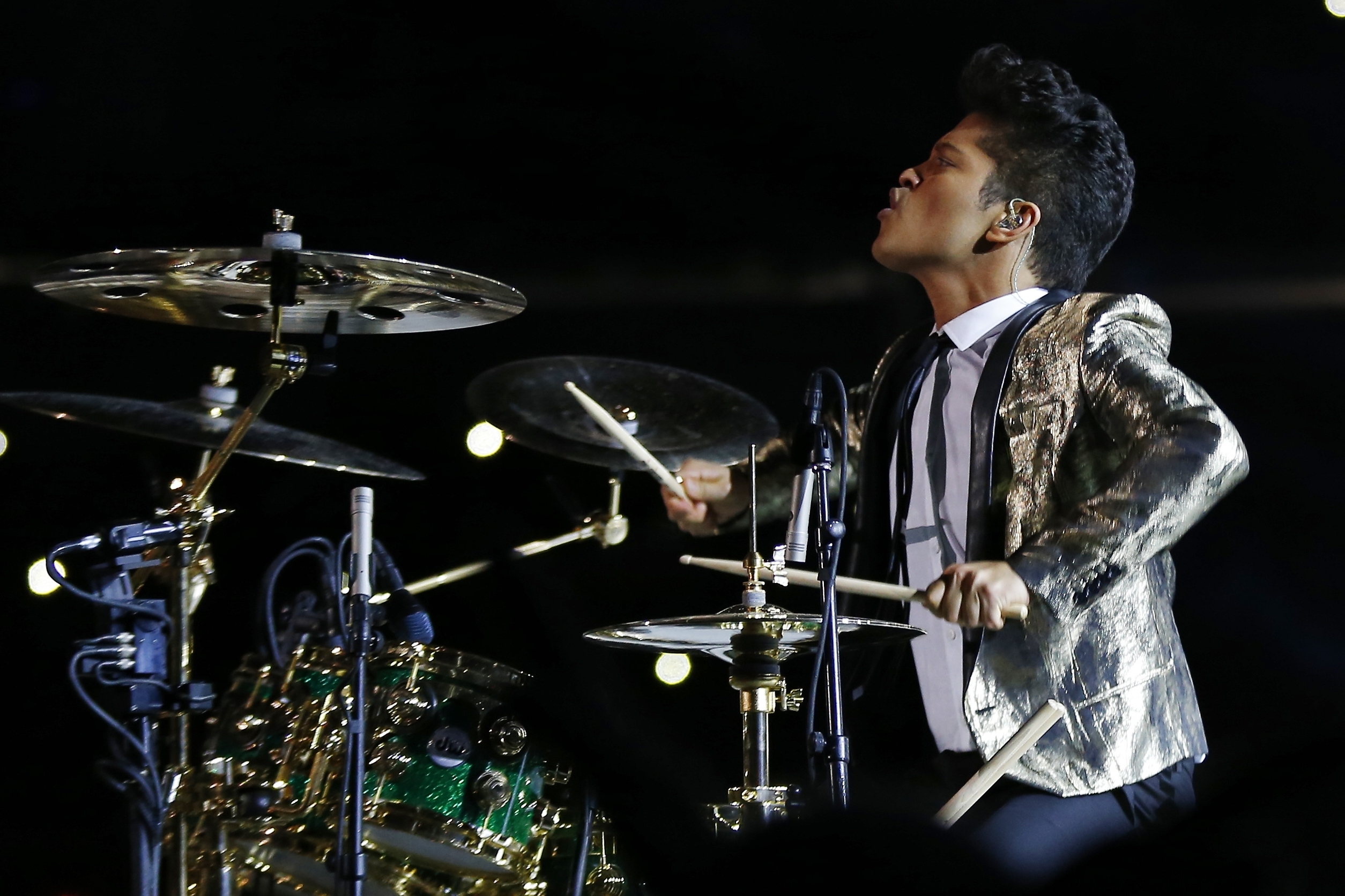 Bruno Mars performs during the halftime show of the NFL Super Bowl XLVIII football game Sunday, Feb. 2, 2014, in East Rutherford, N.J. (AP Photo/Paul Sancya)