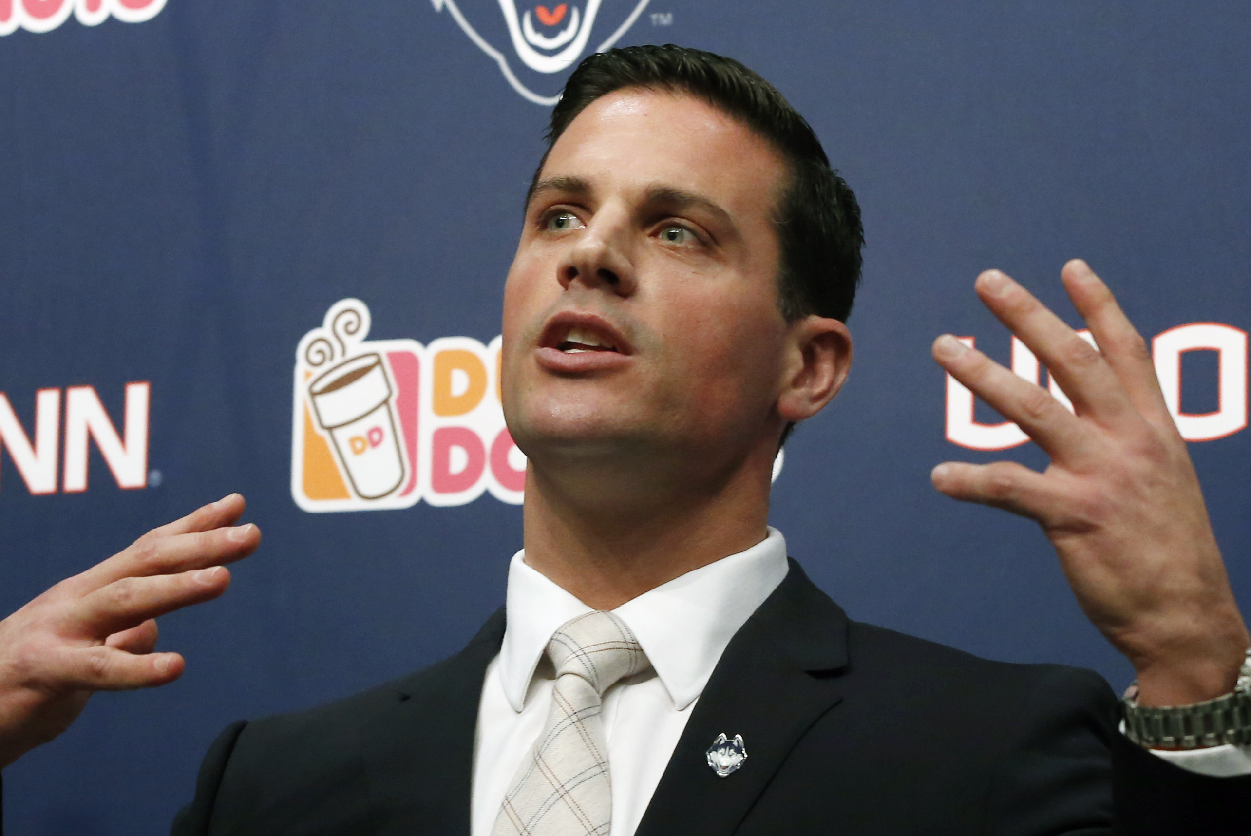 Bob Diaco, former Notre Dame defensive coordinator, speaks as Connecticut's new head football coach during an introductory news conference on campus in Storrs, Conn., Thursday, Dec. 12, 2013. (AP Photo/Elise Amendola)
