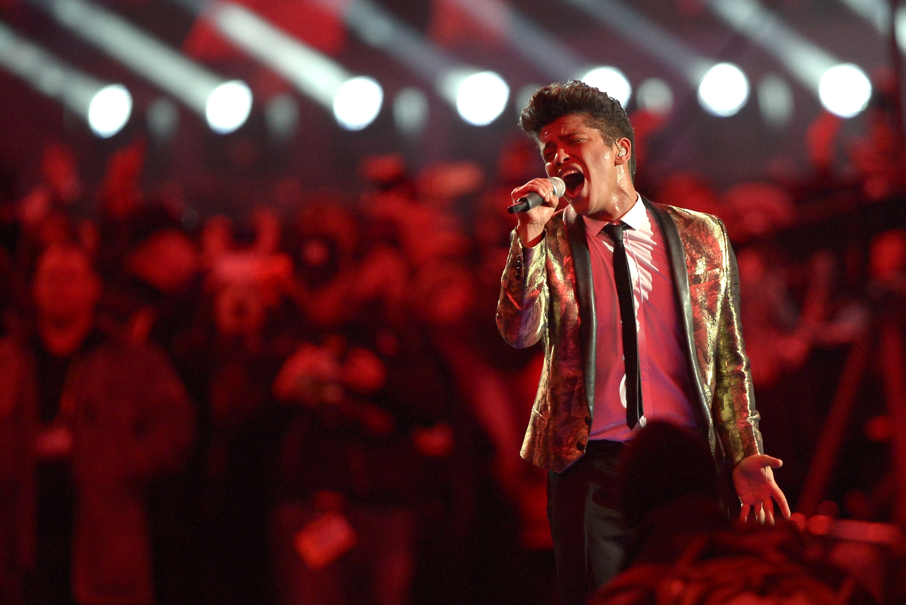 Bruno Mars performs during the halftime show of the NFL Super Bowl XLVIII football game between the Seattle Seahawks and the Denver Broncos Sunday, Feb. 2, 2014, in East Rutherford, N.J. (AP Photo/Bill Kostroun)