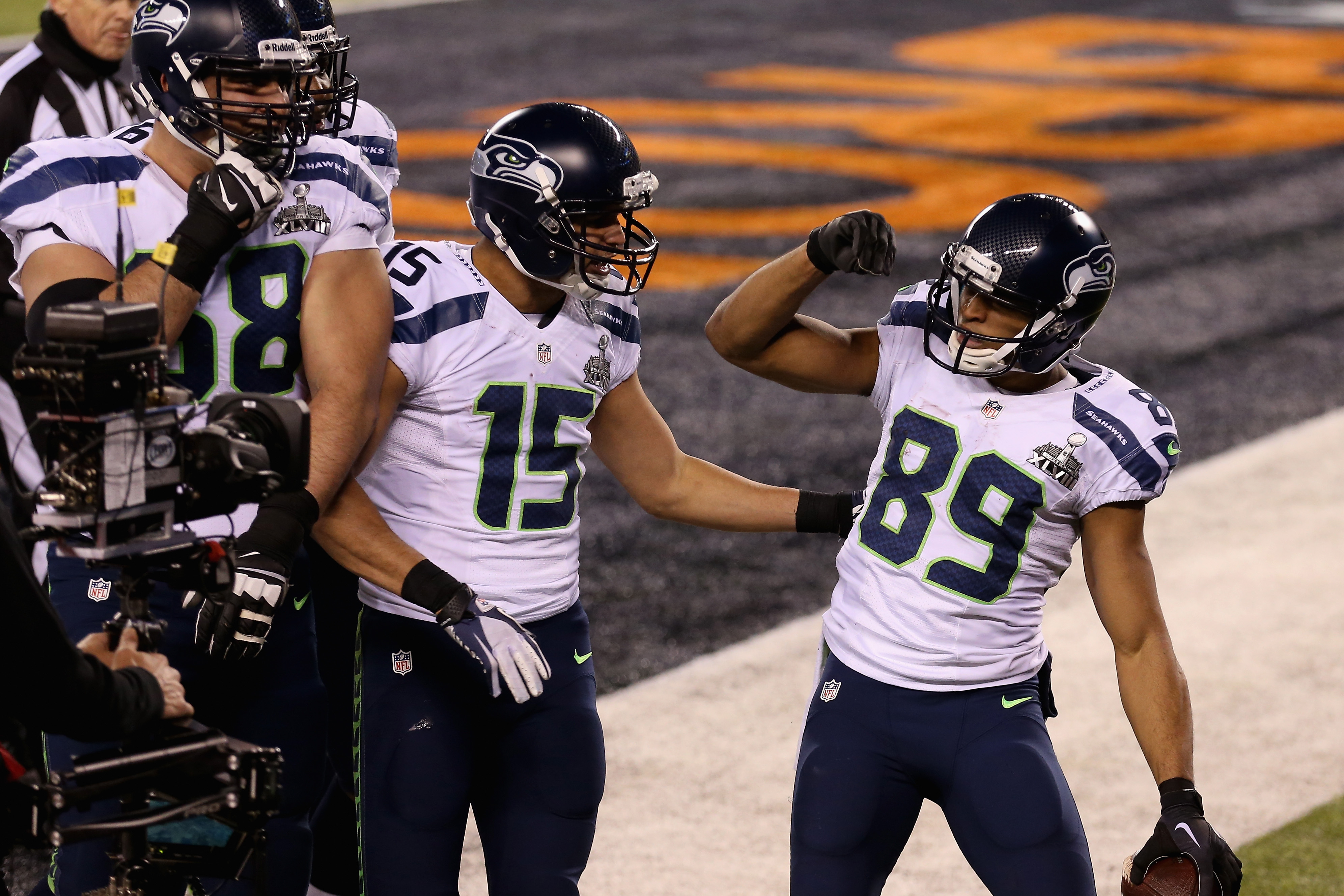 EAST RUTHERFORD, NJ - FEBRUARY 02: Wide receiver Doug Baldwin #89 of the Seattle Seahawks  celebrates his fourth quarter touchdown during Super Bowl XLVIII at MetLife Stadium on February 2, 2014 in East Rutherford, New Jersey.  (Photo by Christian Petersen/Getty Images)