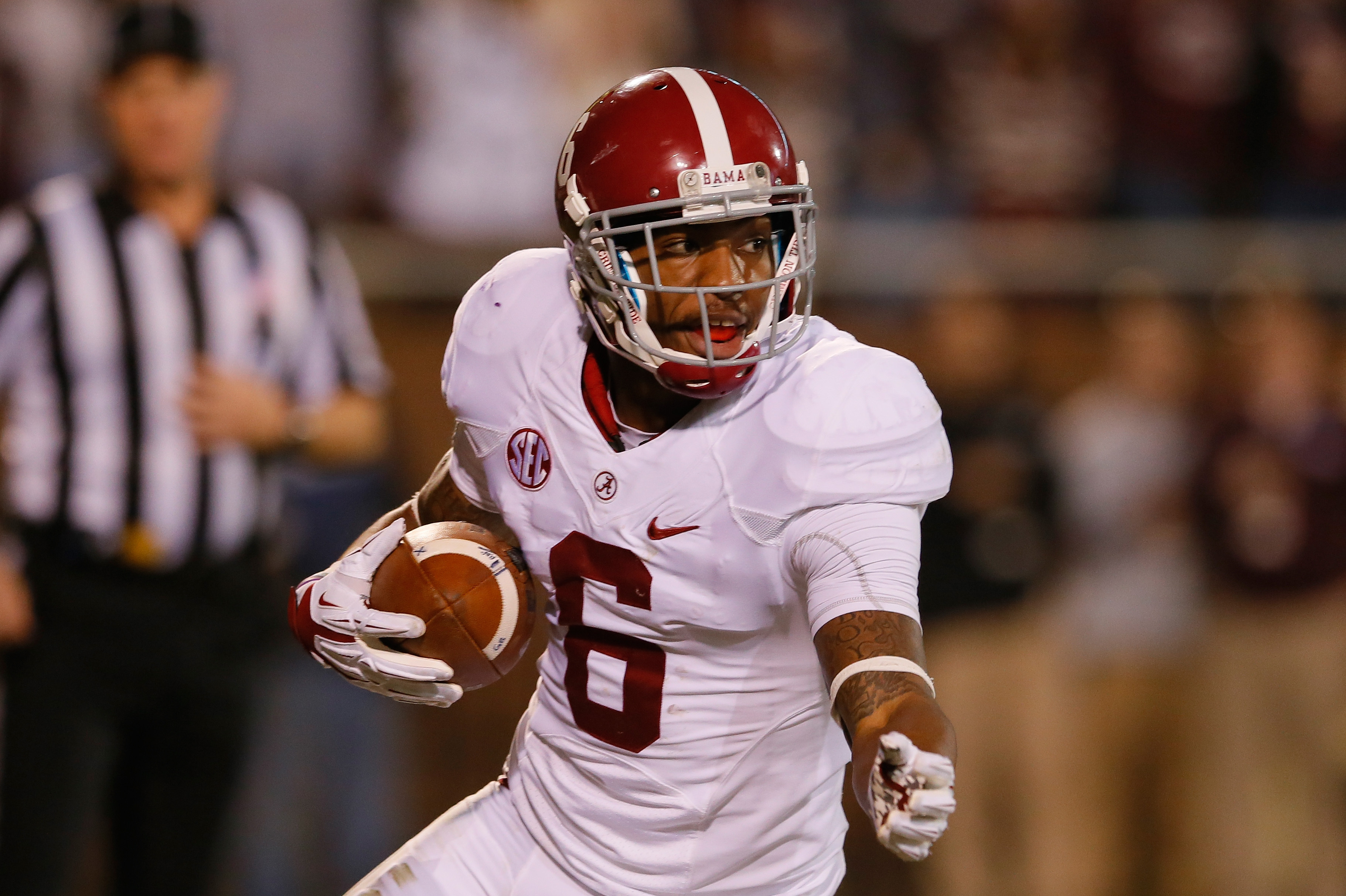 STARKVILLE, MS - NOVEMBER 16:  Ha Ha Clinton-Dix #6 of the Alabama Crimson Tide intercepts a touchdown reception intended for Jameon Lewis #4 of the Mississippi State Bulldogs at Davis Wade Stadium on November 16, 2013 in Starkville, Mississippi.  (Photo by Kevin C. Cox/Getty Images)