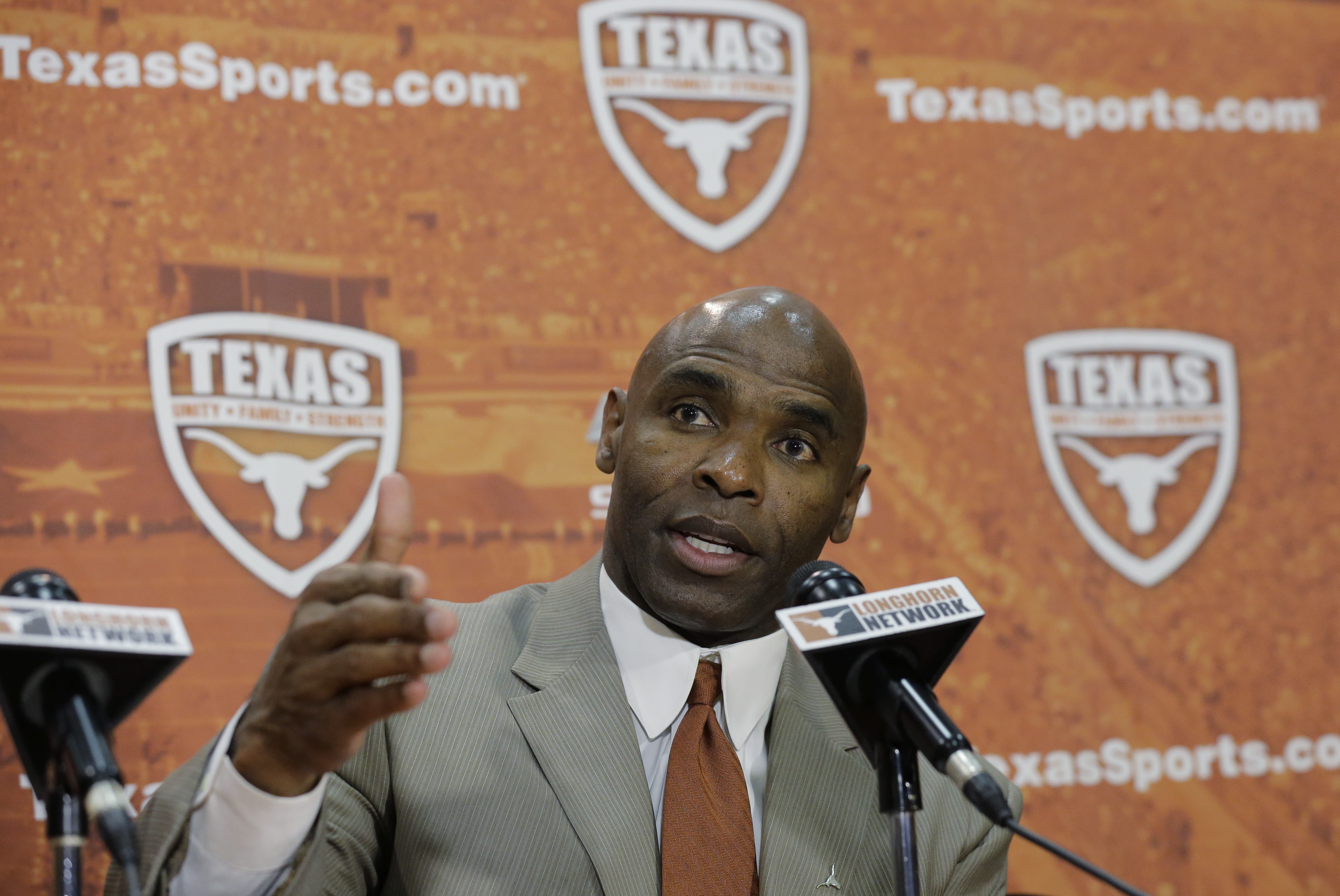 Charlie Strong answers questions during a news conference where he was introduce as the new Texas football coach, Monday,  Jan. 6, 2014, in Austin, Texas. (AP Photo/Eric Gay)
