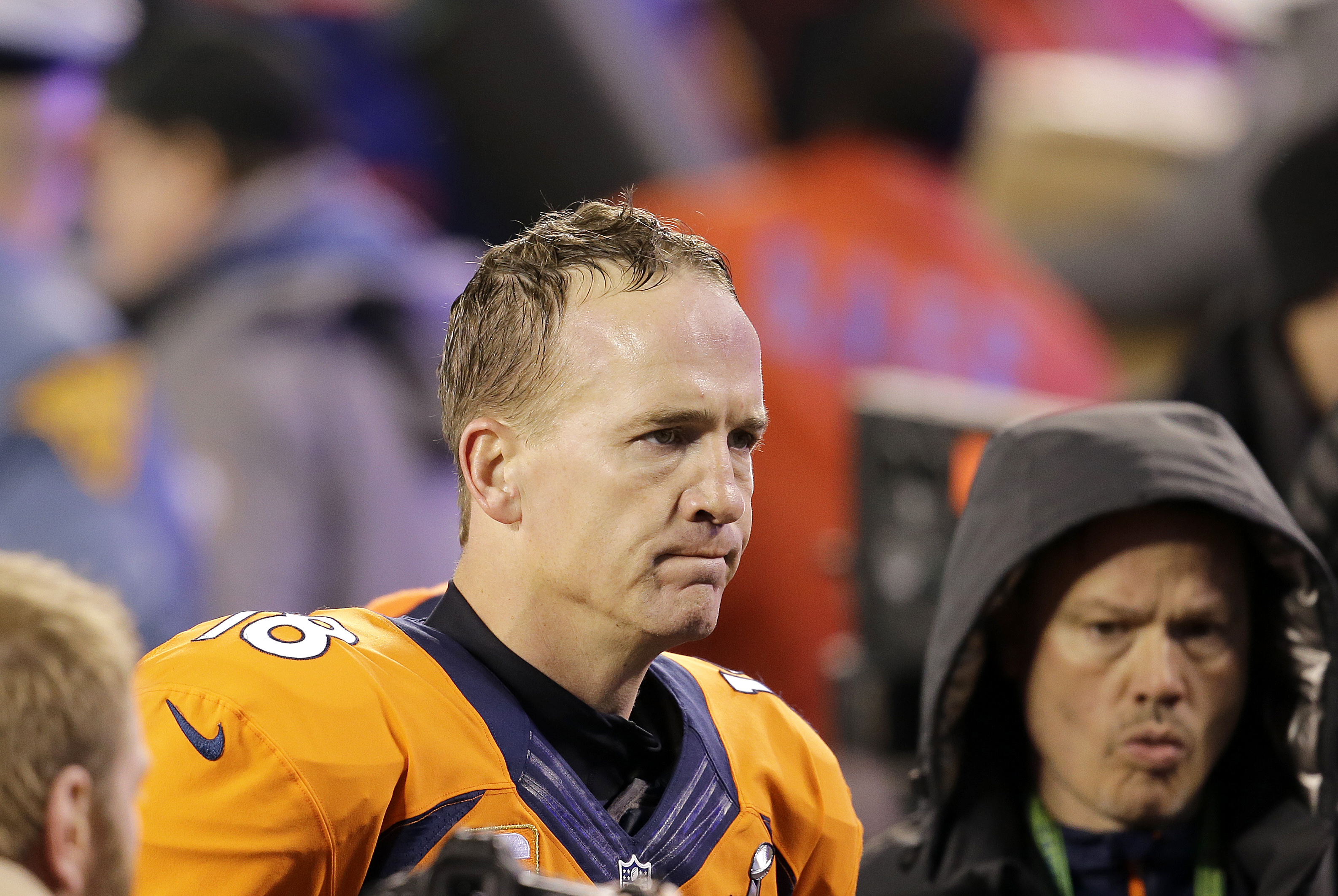 Denver Broncos' Peyton Manning walks off the field after the NFL Super Bowl XLVIII football game against the Seattle Seahawks Sunday, Feb. 2, 2014, in East Rutherford, N.J. The Seahawks won 43-8. (AP Photo/Chris O'Meara)