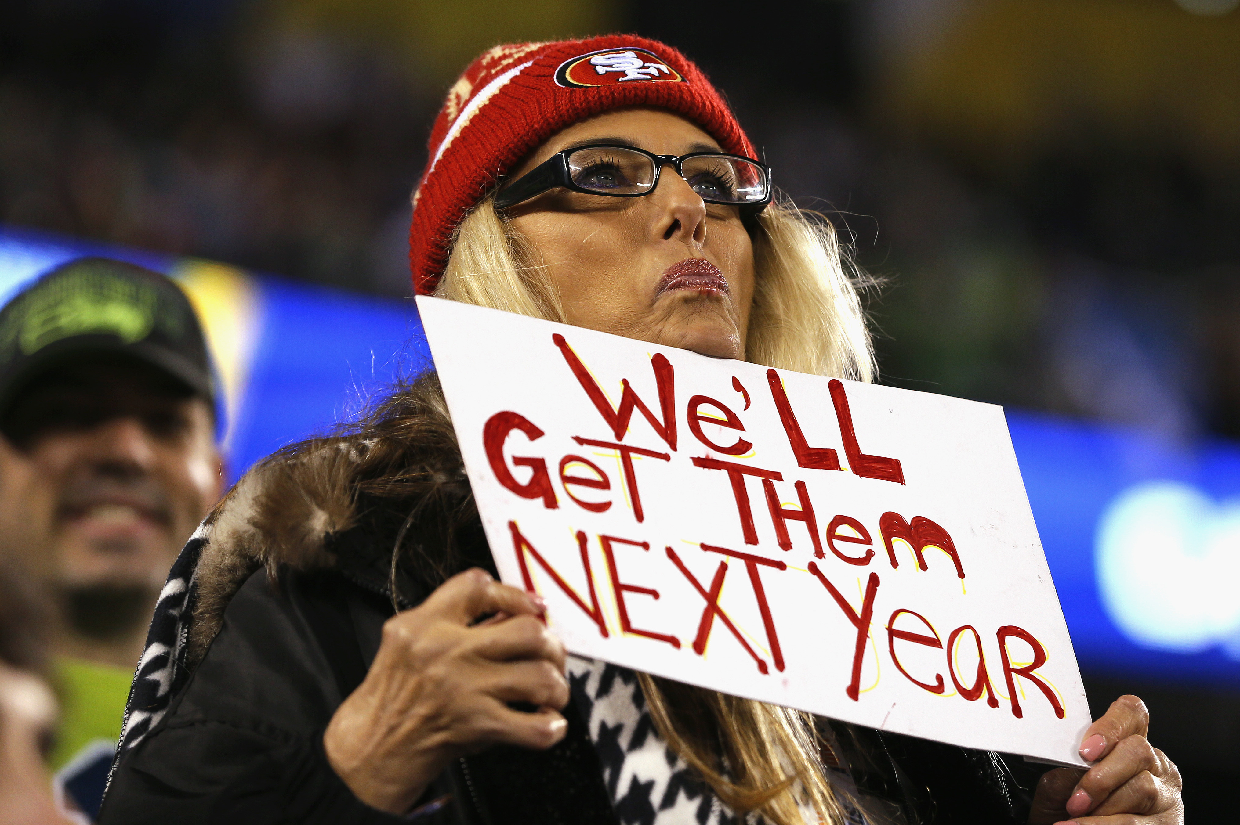 EAST RUTHERFORD, NJ - FEBRUARY 02: A fan wearing a San Francisco 49ers hat holds up a sign that reads 'We'll Get Them Next Year' as the Seattle Seahawks take on the Denver Broncos during Super Bowl XLVIII at MetLife Stadium on February 2, 2014 in East Rutherford, New Jersey.  (Photo by Kevin C. Cox/Getty Images)