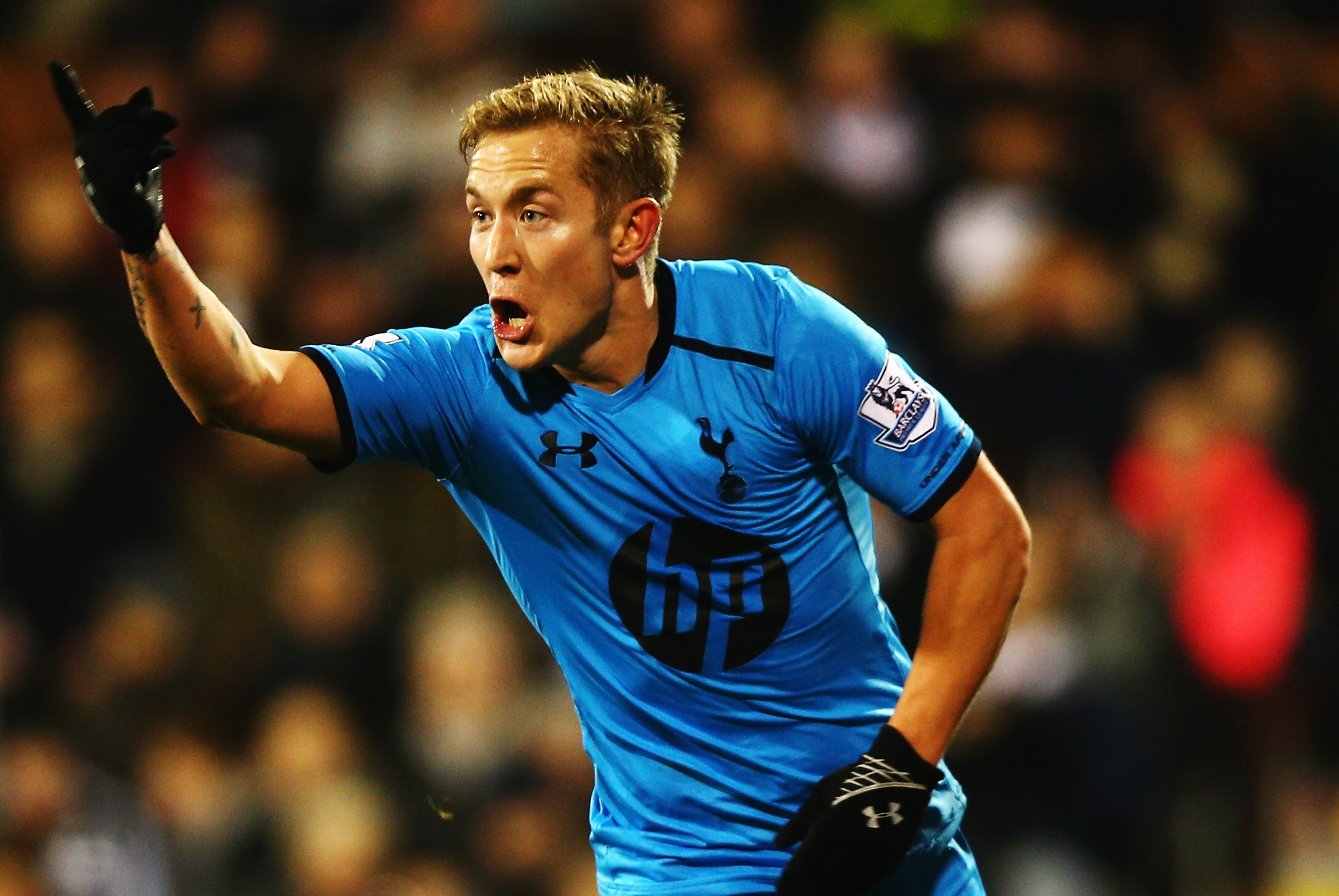LONDON, ENGLAND - DECEMBER 04:  Lewis Holtby of Tottenham Hotspur celebrates scoring the winning goal during the Barclays Premier League match between Fulham and Tottenham Hotspur at Craven Cottage on December 4, 2013 in London, England.  (Photo by Paul Gilham/Getty Images)
