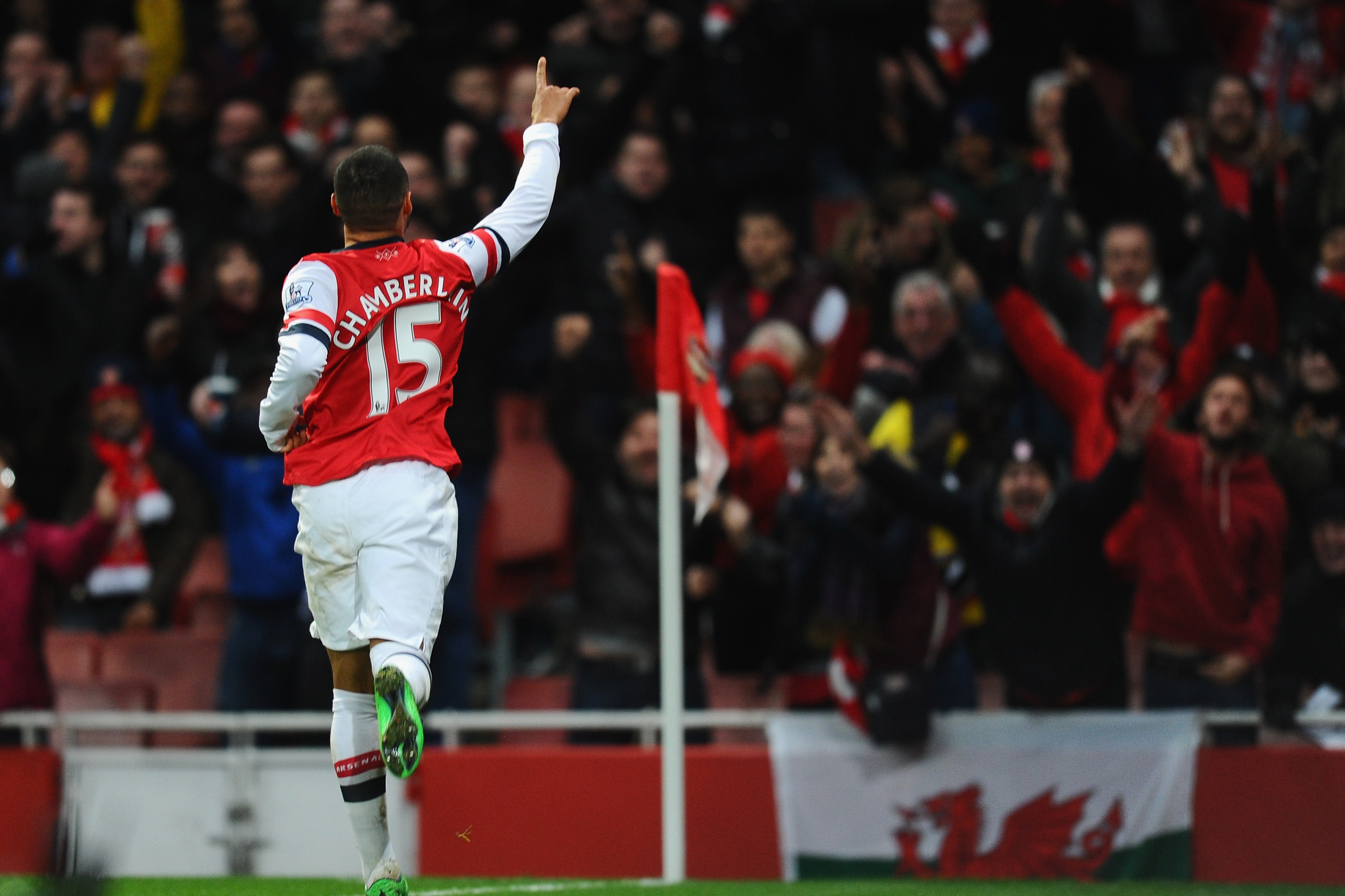 LONDON, ENGLAND - FEBRUARY 02:  Alex Oxlade-Chamberlain of Arsenal celebrates after scoring his first goal of Crystal Palace during the Barclays Premier League match between Arsenal and Crystal Palace at Emirates Stadium on February 2, 2014 in London, England.  (Photo by Mike Hewitt/Getty Images)