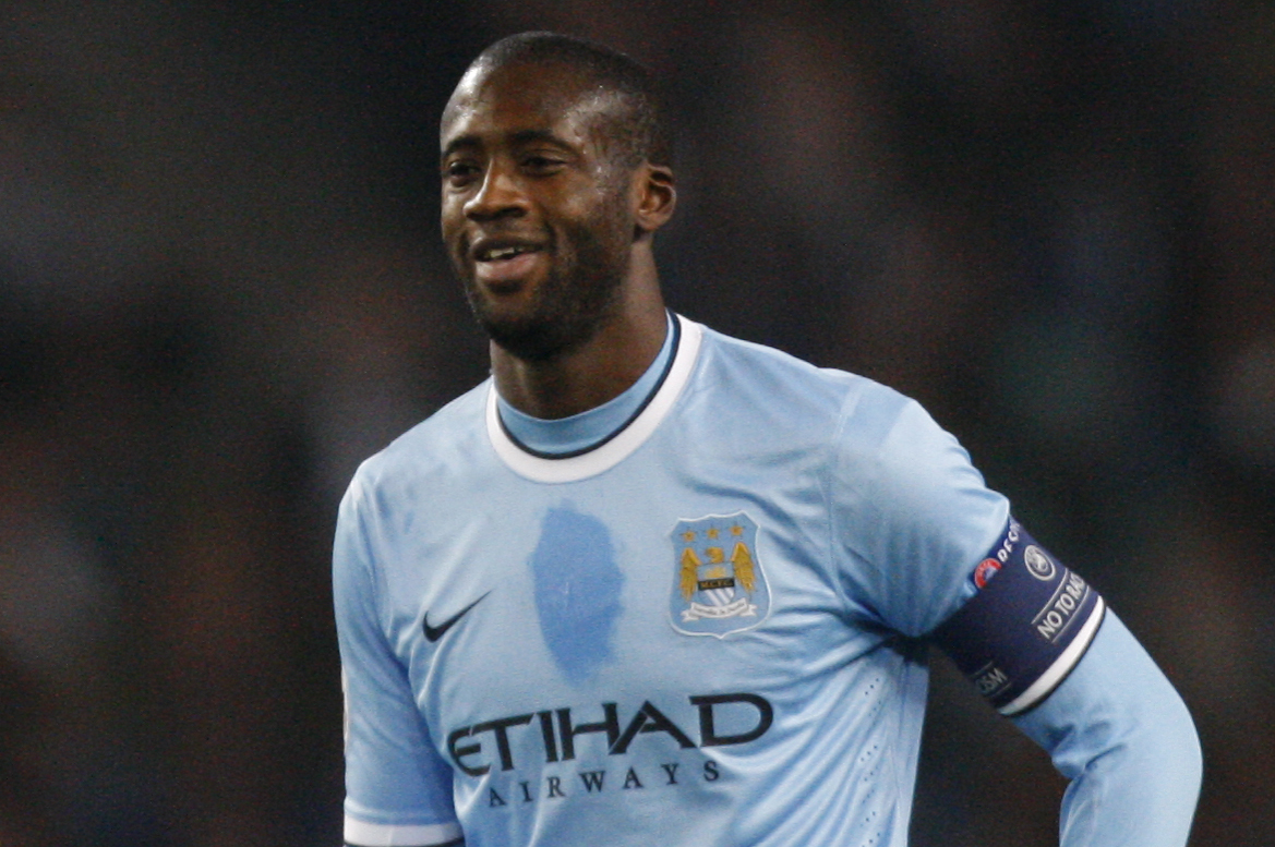 Manchester City's Yaya Toure smiles during his team's Champions League Group D soccer match against CSKA Moscow at the Etihad Stadium, Manchester, England, Tuesday Nov. 5, 2013. (AP Photo/Jon Super)