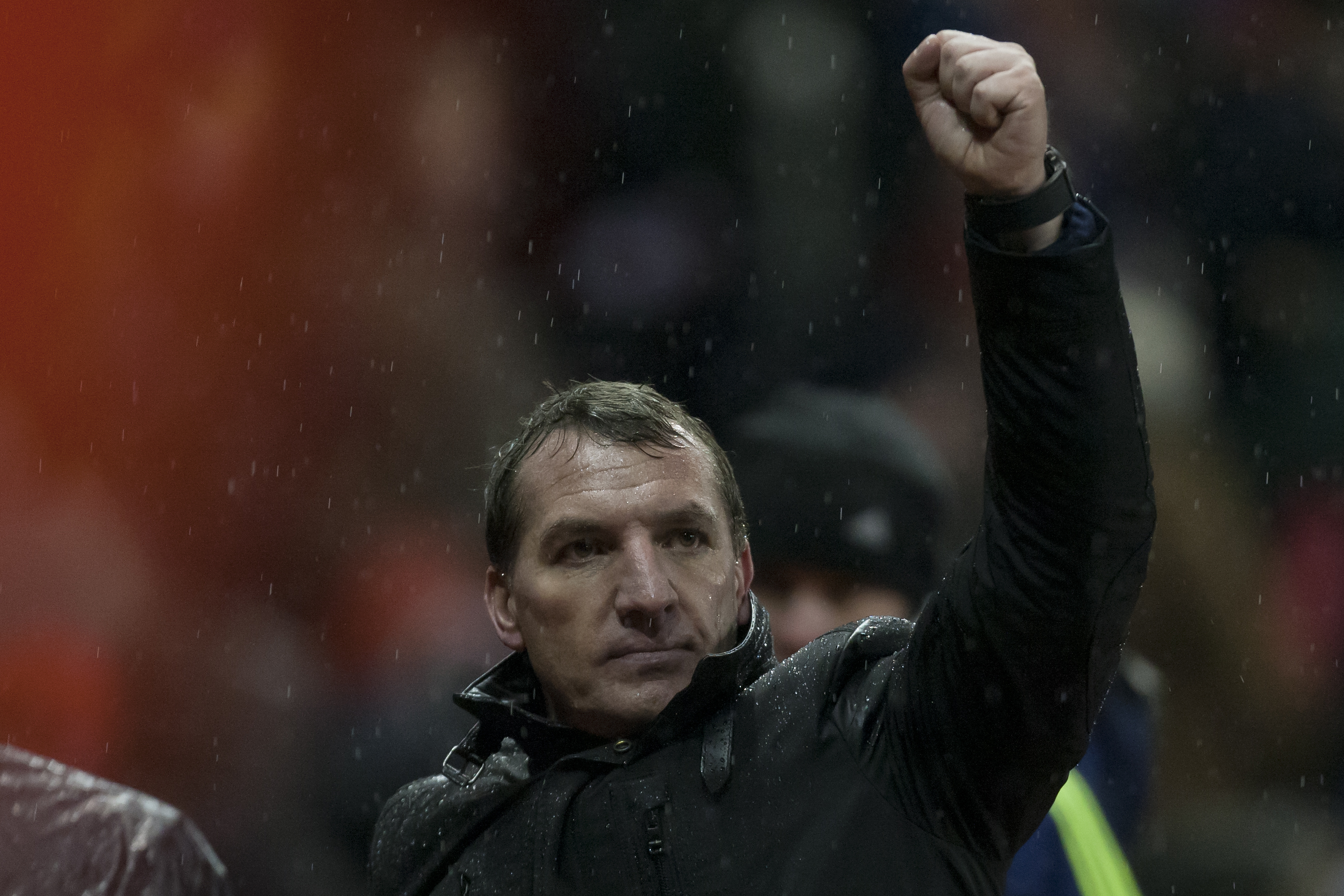 Liverpool's manager Brendan Rodgers celebrates after his team's 5-3 win against Stoke in their English Premier League soccer match at the Britannia Stadium, Stoke, England, Sunday Jan 12, 2014. (AP Photo/Jon Super)