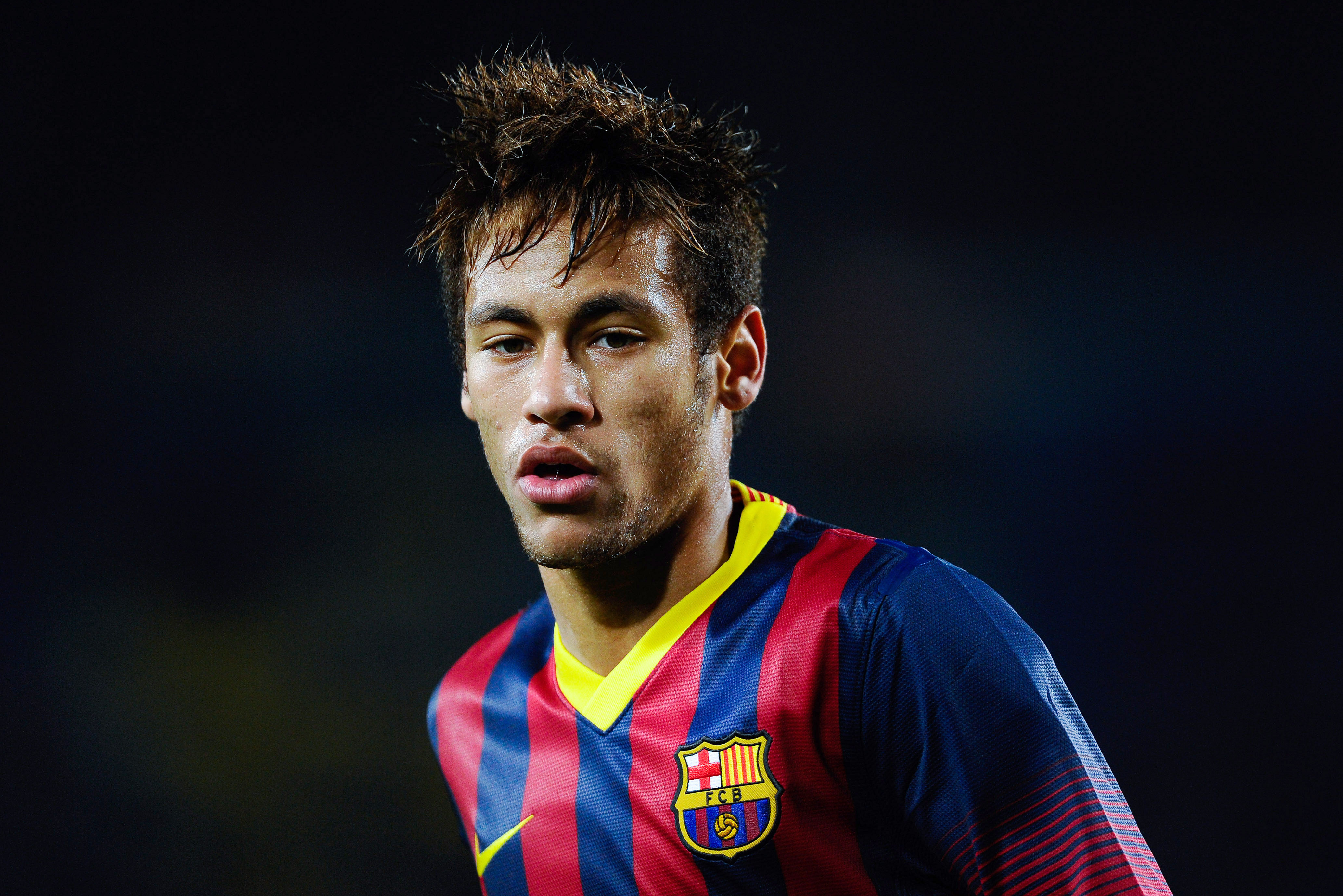 BARCELONA, SPAIN - DECEMBER 17:  Neymar of FC Barcelona looks on during the Copa del Rey round of 32 second leg match between FC Barcelona and Cartagena at Camp Nou on December 17, 2013 in Barcelona, Spain.  (Photo by David Ramos/Getty Images)