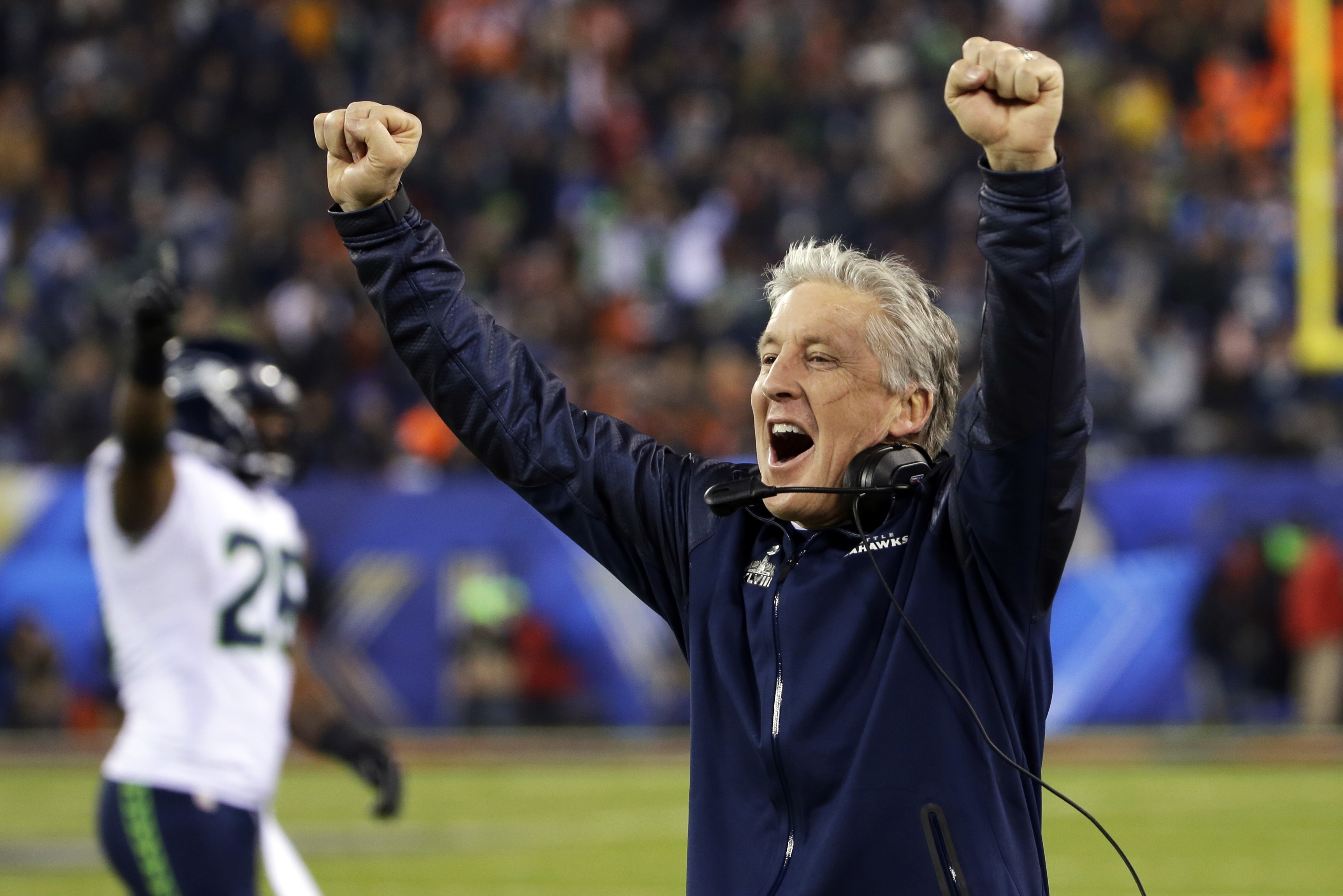 Seattle Seahawks head coach Pete Carroll celebrates as Percy Harvin returns a kickoff for a touchdown during the second half of the NFL Super Bowl XLVIII football game against the Denver Broncos, Sunday, Feb. 2, 2014, in East Rutherford, N.J. (AP Photo/Matt Slocum)