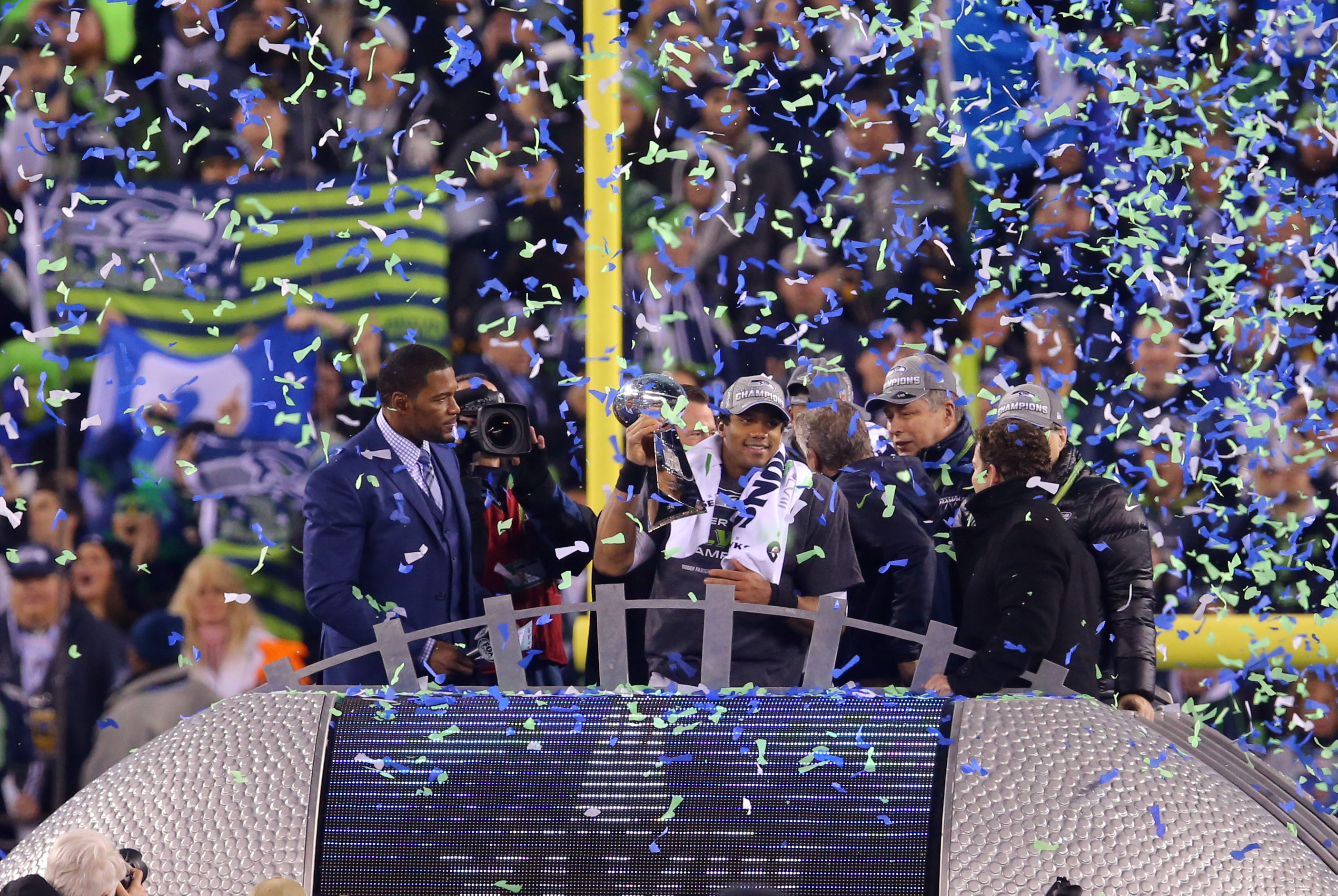 Feb 2, 2014; East Rutherford, NJ, USA; Seattle Seahawks quarterback Russell Wilson (3) with the Vince Lombardi Trophy after Super Bowl XLVIII against the Denver Broncos at MetLife Stadium. Seattle Seahawks won 43-8.  Mandatory Credit: Jim O'Connor-USA TODAY Sports