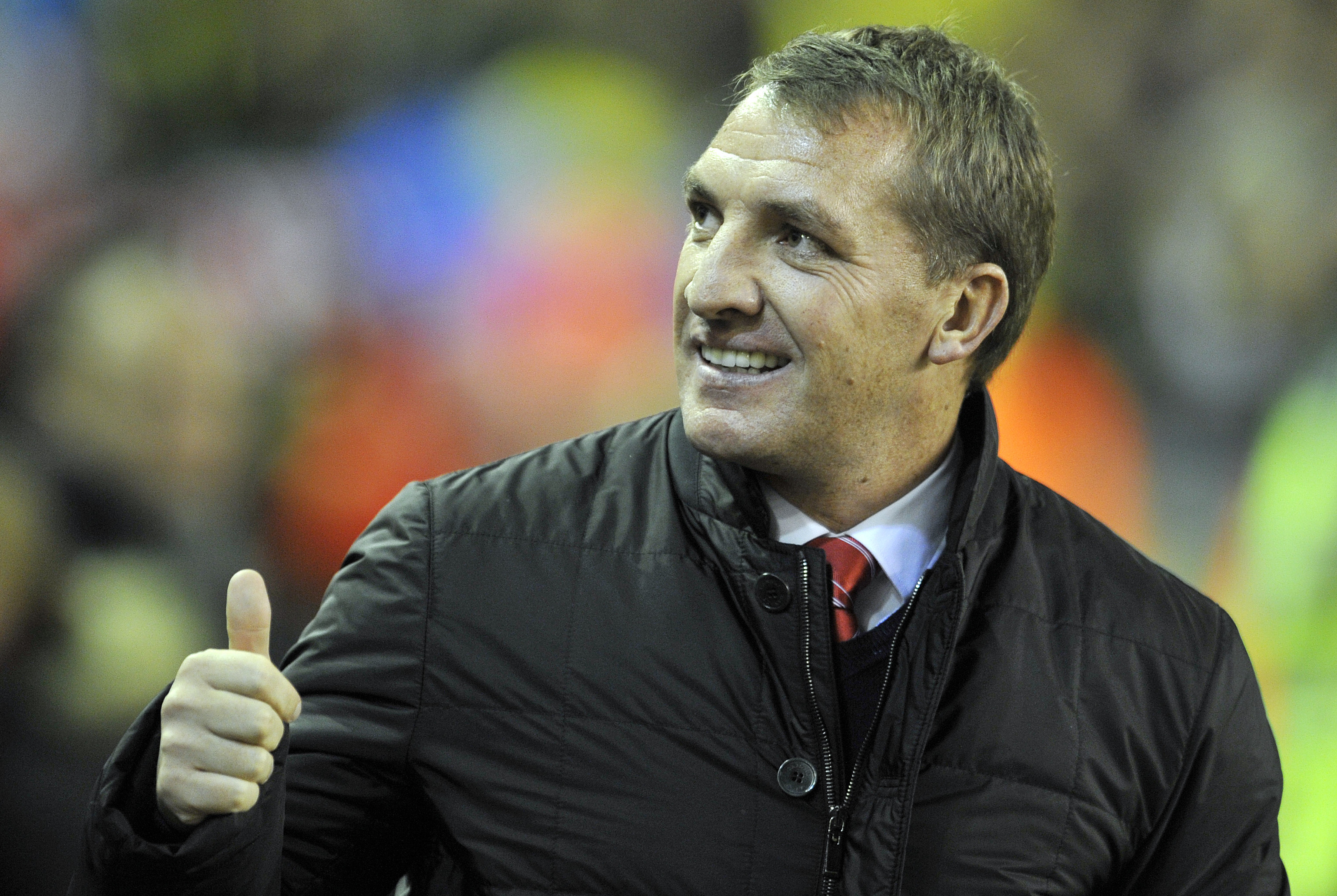 Liverpool's manager Brendan Rodgers gestures during their English Premier League soccer match against Norwich City at Anfield in Liverpool, England, Wednesday Dec. 4, 2013. (AP Photo/Clint Hughes)