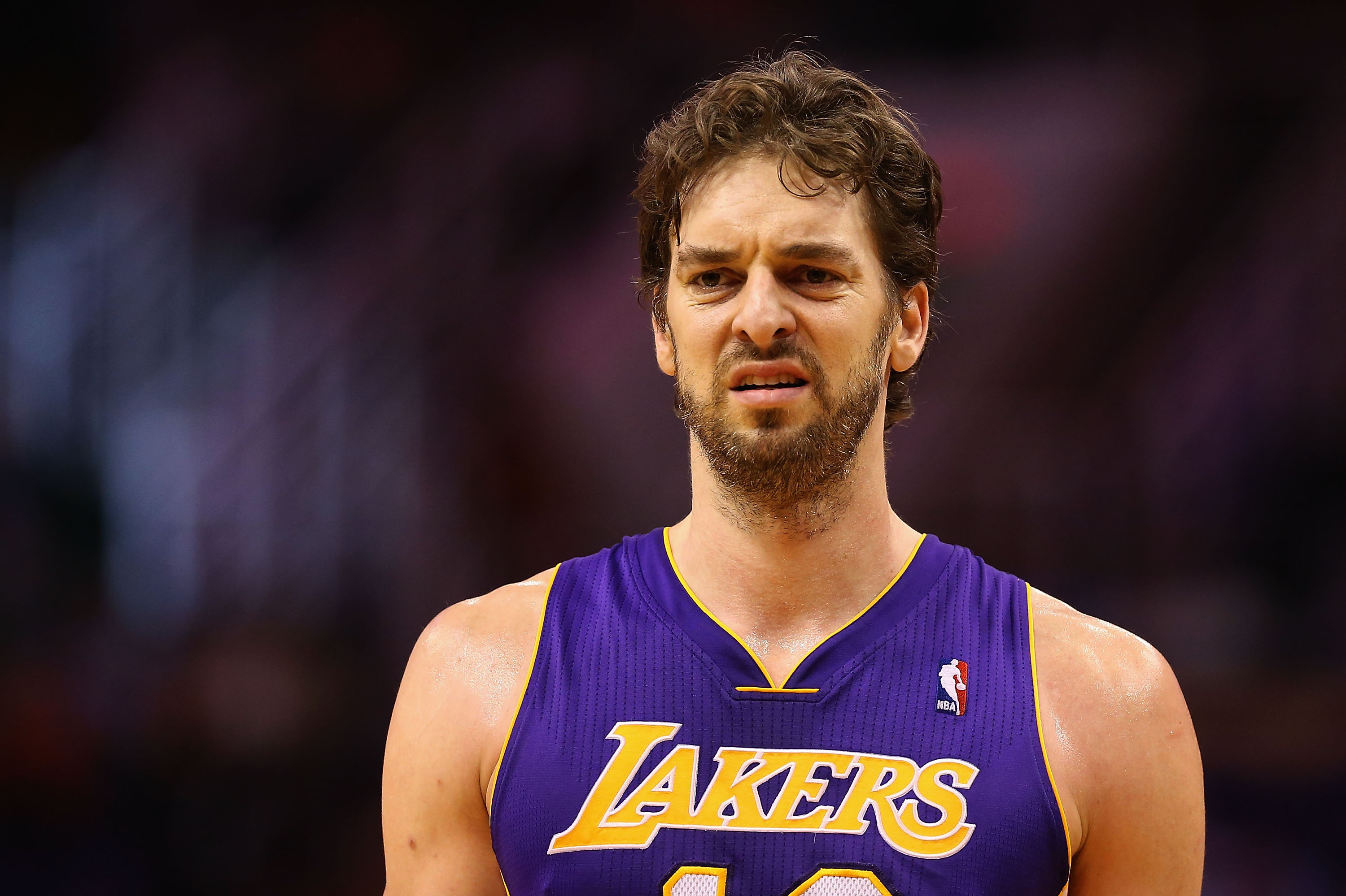 PHOENIX, AZ - JANUARY 15:  Pau Gasol #16 of the Los Angeles Lakers during the NBA game against the Phoenix Suns at US Airways Center on January 15, 2014 in Phoenix, Arizona.  The Suns defeated the Lakers 121-114. NOTE TO USER: User expressly acknowledges and agrees that, by downloading and or using this photograph, User is consenting to the terms and conditions of the Getty Images License Agreement.  (Photo by Christian Petersen/Getty Images)