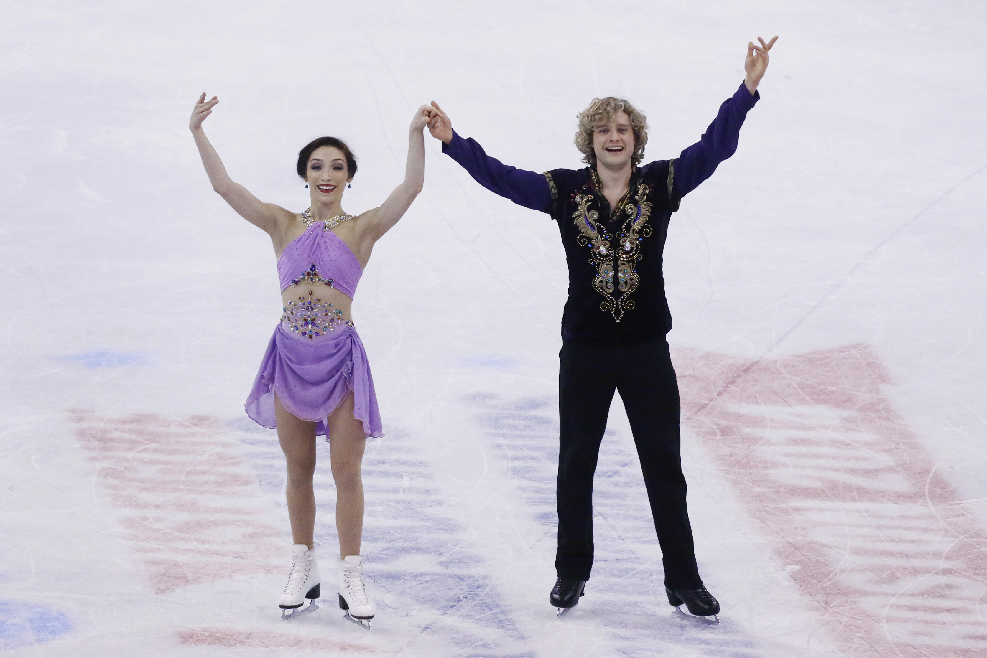IMAGE DISTRIBUTED FOR PUFFS - Meryl Davis and Charlie White skating at the US Figure Skating Championships in Boston on Saturday, Jan. 11, 2014. (Bizuayehu Tesfaye/AP Images for Puffs)
