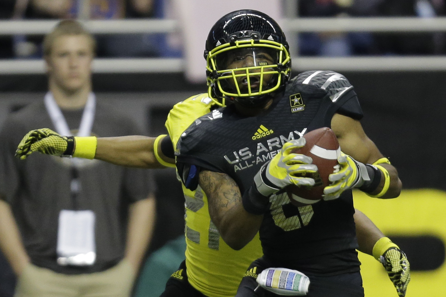 U.S. Army All-American East's Demarre Kitt (8) makes a catch as U.S. Army All-American West's Damon Webb (21) defends during the U.S. Army All-American Bowl football game, Saturday, Jan. 4, 2014, in San Antonio. (AP Photo/Eric Gay)