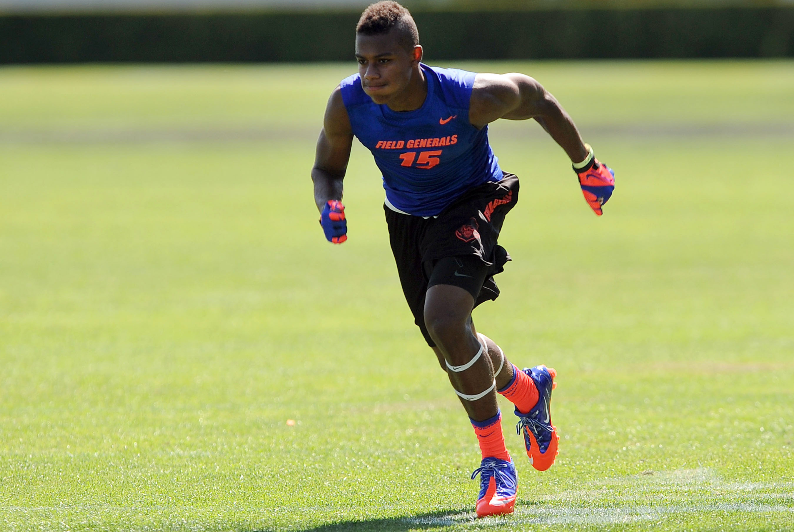 Jul 2, 2013; Beaverton, OR, USA; Wide receiver Malachi Dupre (15) runs a pass route during the Nike 7on7 pool play at Nike World Headquarters in Beaverton, Oregon on Tuesday July, 2, 2013. Mandatory Credit: Steve Dykes-USA TODAY Sports