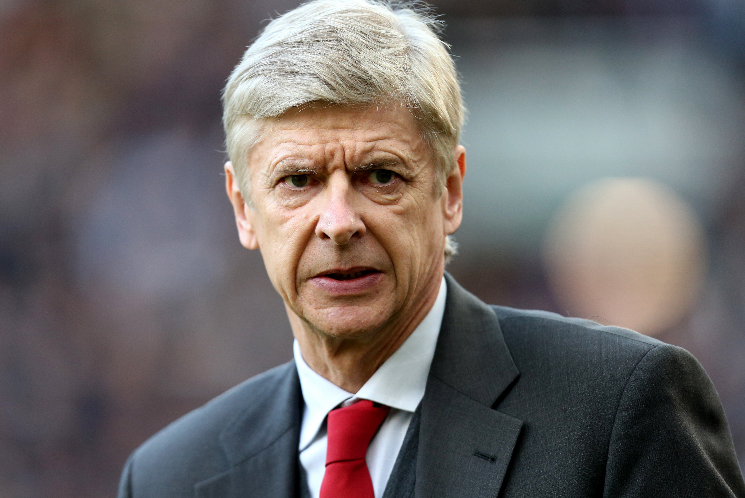 Arsenal's manager Arsene Wenger looks on ahead of their English Premier League soccer match against Newcastle United at St James' Park, Newcastle, England, Sunday, Dec. 29, 2013. (AP Photo/Scott Heppell)