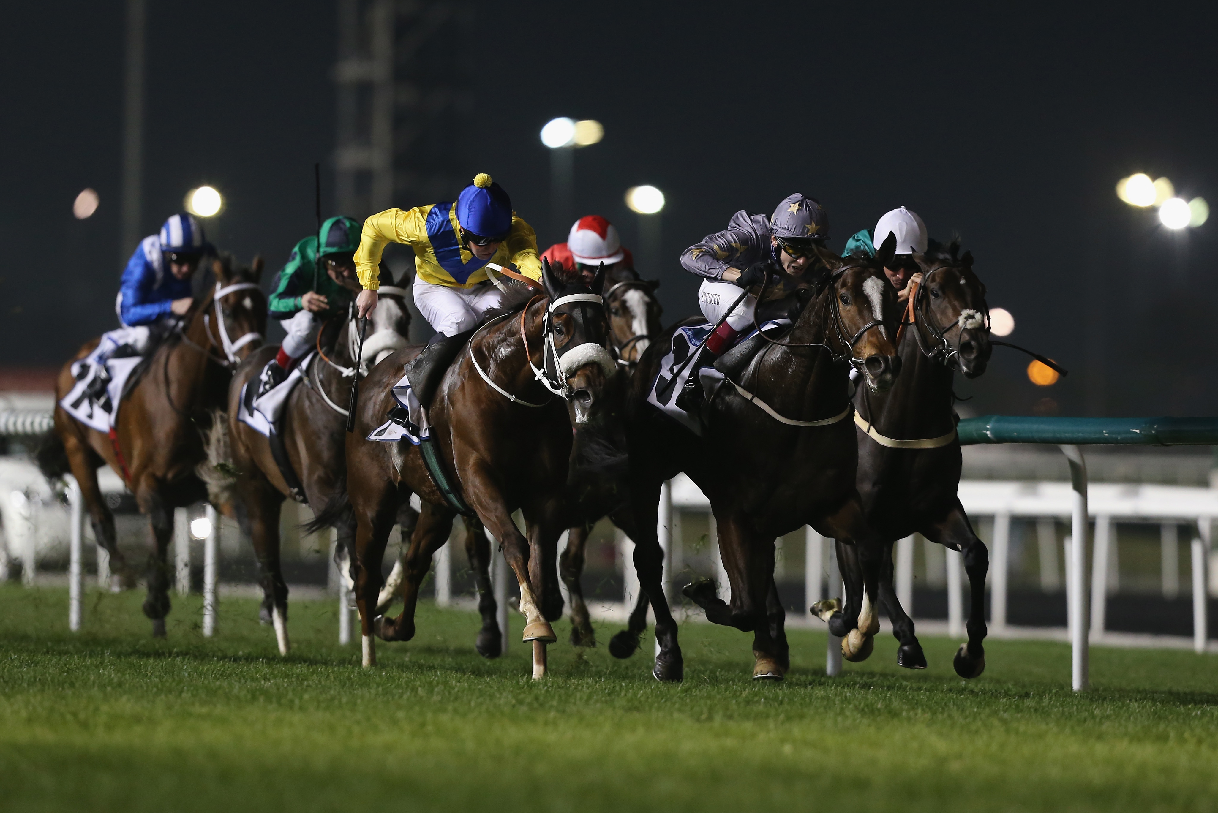 DUBAI, UNITED ARAB EMIRATES - JANUARY 23:  Jamie Spencer riding Gabrial wins Race 6, Property Weekly during the third Dubai World Cup Carnival Meeting at the Meydan Racecourse on January 23, 2014 in Dubai, United Arab Emirates.  (Photo by Francois Nel/Getty Images)