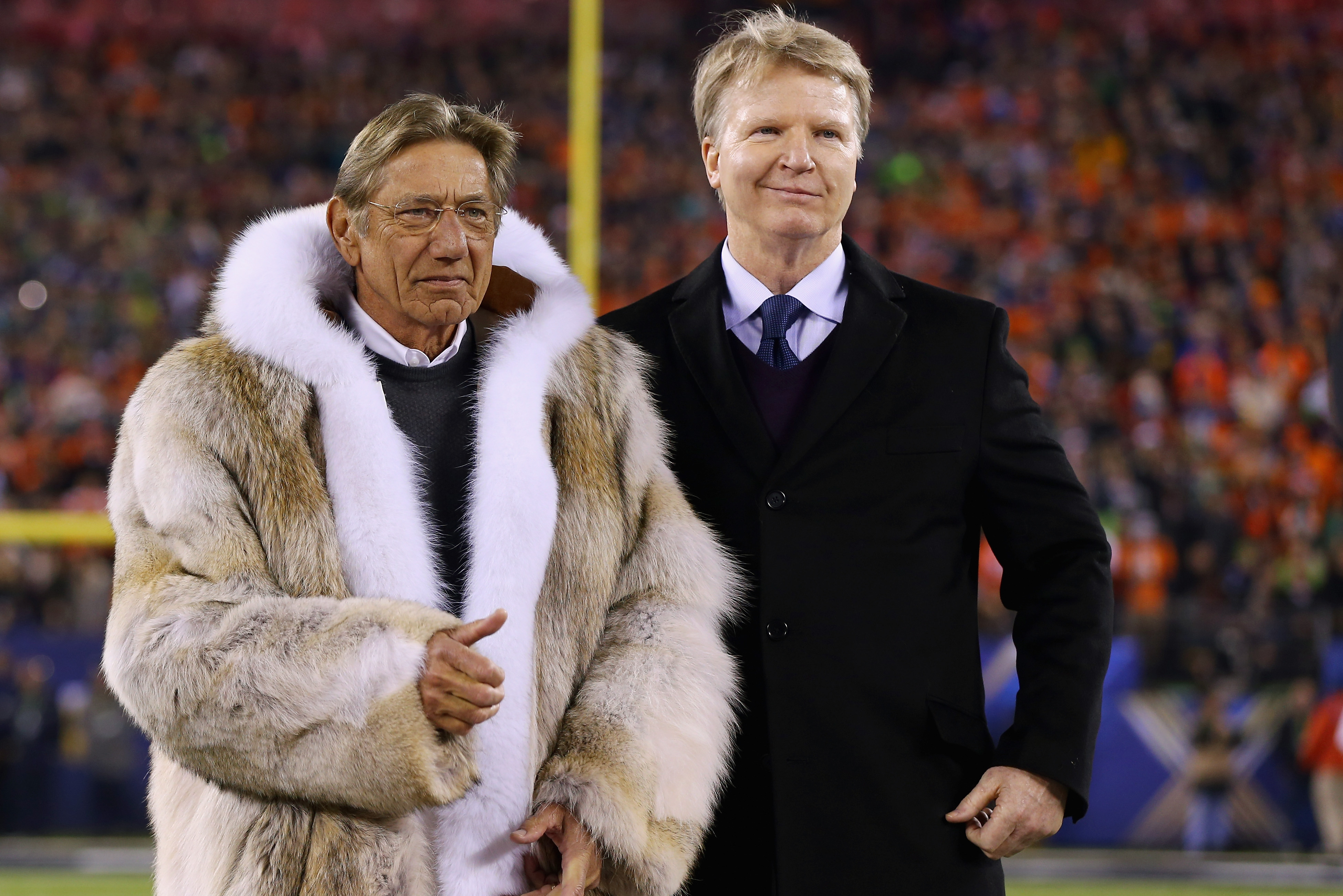 EAST RUTHERFORD, NJ - FEBRUARY 02:  Joe Namath talks with Phil Simms prior to start of Super Bowl XLVIII between the Denver Broncos and the Seattle Seahawks  at MetLife Stadium on February 2, 2014 in East Rutherford, New Jersey.  (Photo by Elsa/Getty Images)