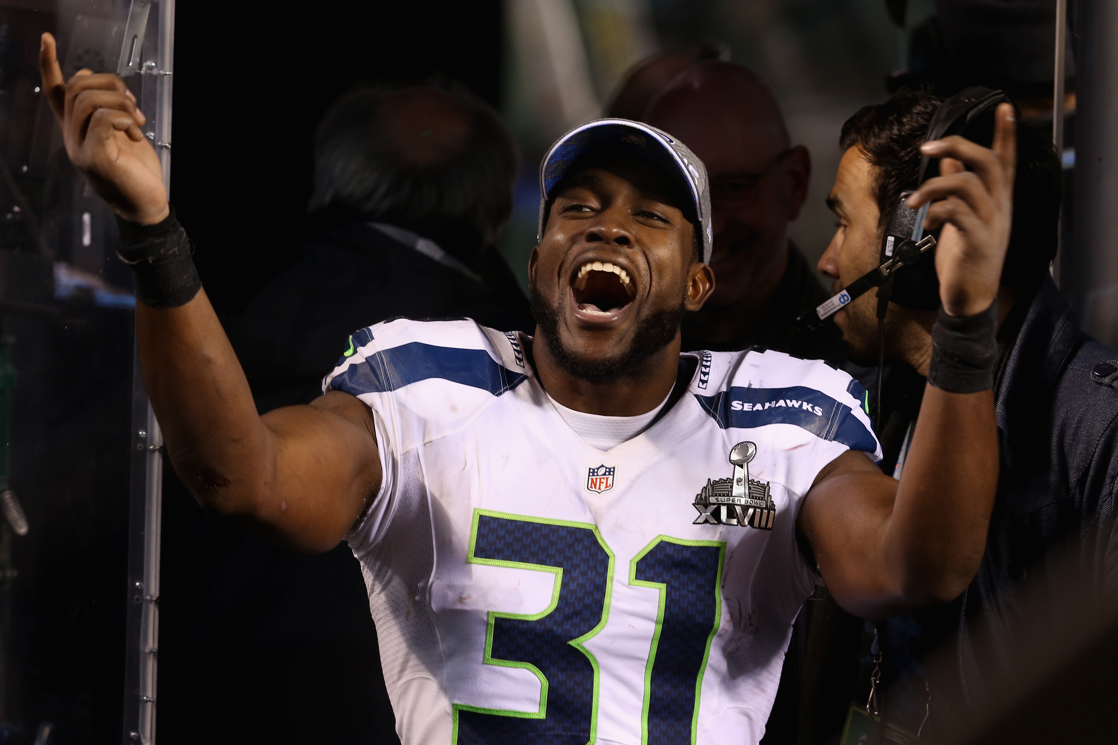 EAST RUTHERFORD, NJ - FEBRUARY 02:  Strong safety Kam Chancellor #31 of the Seattle Seahawks  celebrates after Seattle won Super Bowl XLVIII at MetLife Stadium on February 2, 2014 in East Rutherford, New Jersey. The Seahawks beat the Broncos 43-8.  (Photo by Christian Petersen/Getty Images)