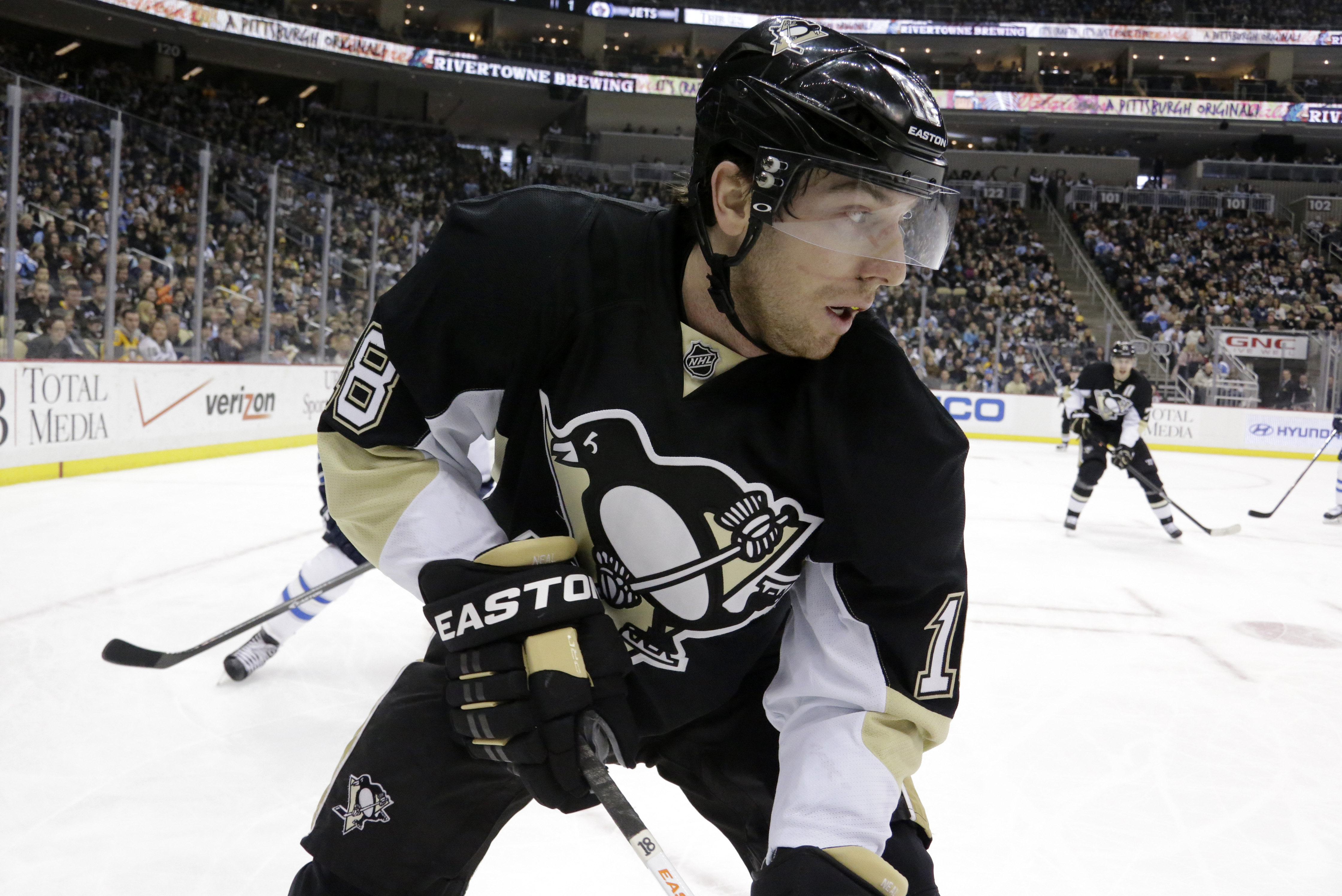 Pittsburgh Penguins' James Neal skates  during the second period of an NHL hockey game between the Pittsburgh Penguins and the Winnipeg Jets in Pittsburgh Sunday, Jan. 5, 2014.(AP Photo/Gene J. Puskar)