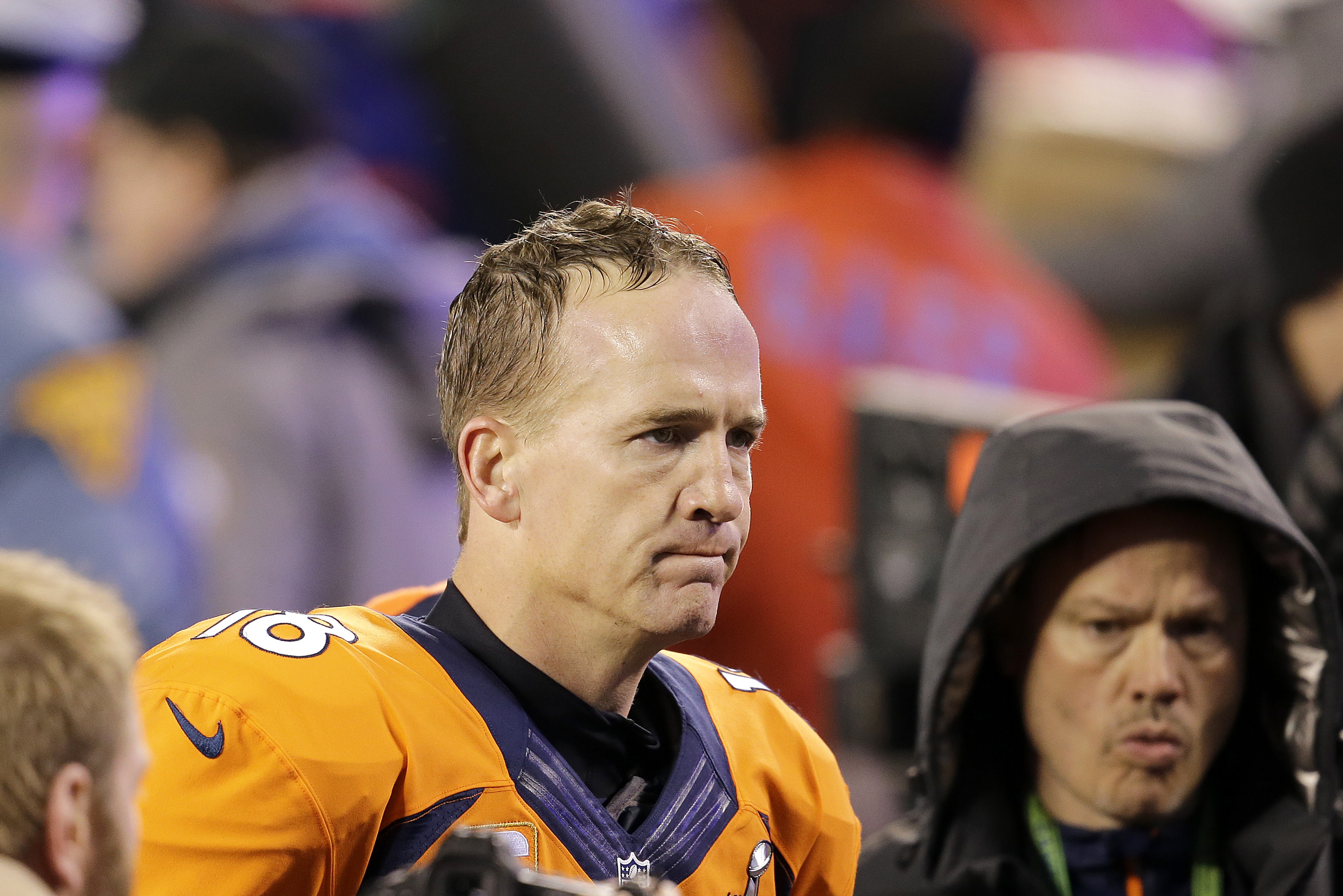 Denver Broncos' Peyton Manning walks off the field after the NFL Super Bowl XLVIII football game against the Seattle Seahawks Sunday, Feb. 2, 2014, in East Rutherford, N.J. The Seahawks won 43-8. (AP Photo/Chris O'Meara)