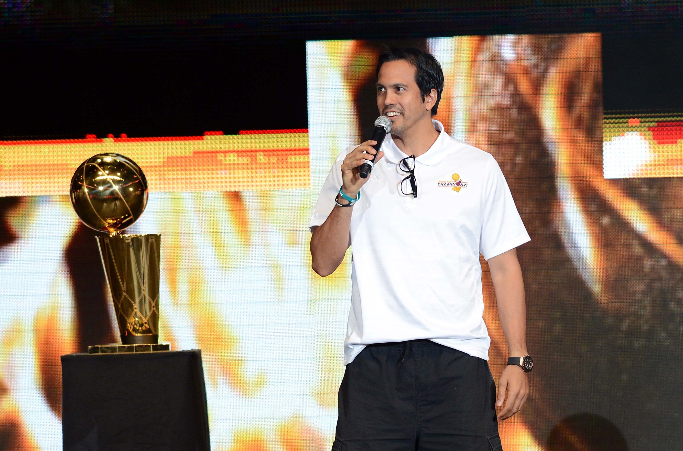 June 25, 2012; Miami, FL, USA; Miami Heat head coach Erik Spoelstra talks after being introduced during the 2012 NBA championship rally at American Airlines Arena. Mandatory Credit: Steve Mitchell-USA TODAY Sports