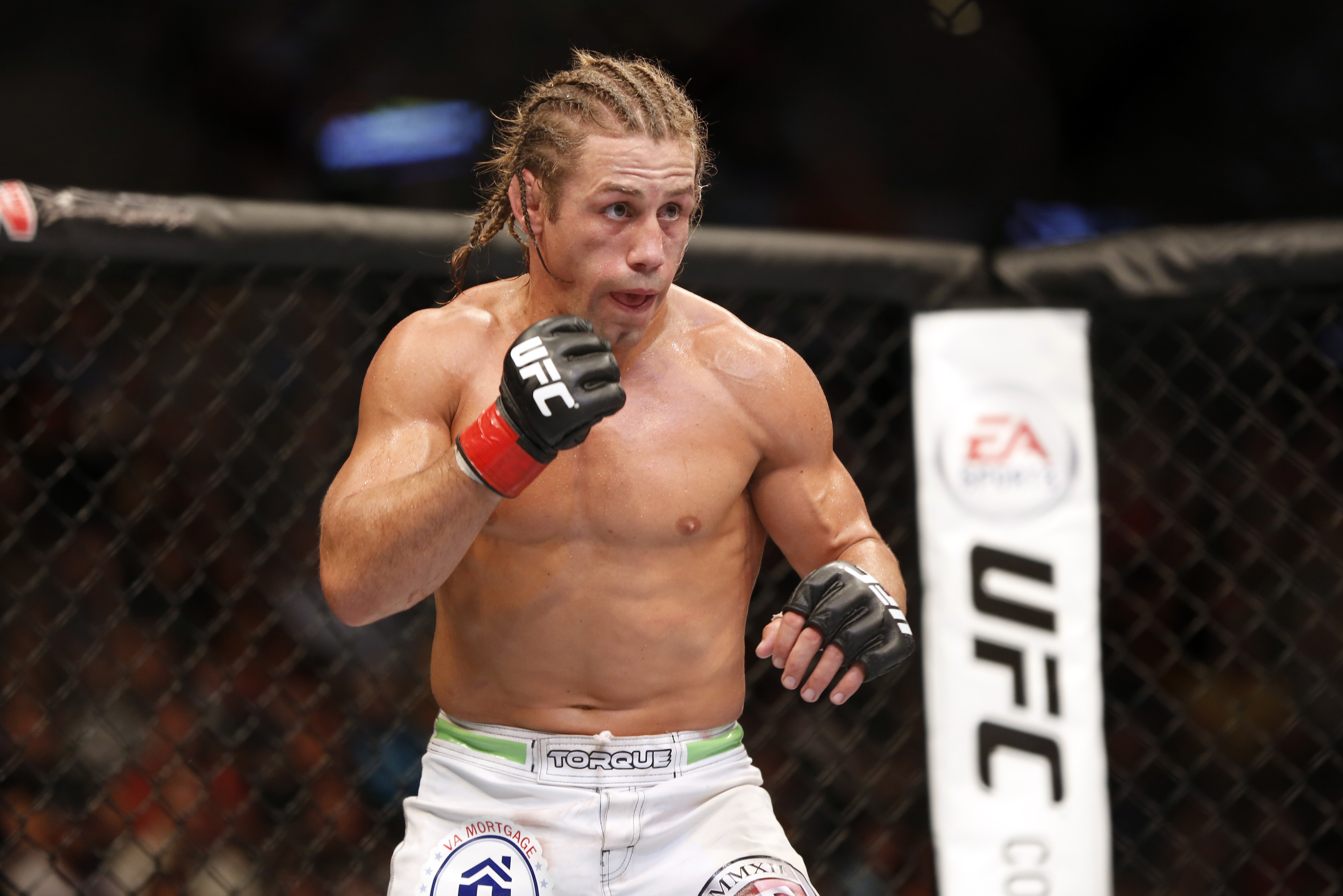 Uriah Faber is seen in the ring against Yuri Alcantra in their UFC on Fox Sports 1 mixed martial arts bout in Boston, Saturday, August 17,2013.  Faber won via unanimous decision. (AP Photo/Gregory Payan)