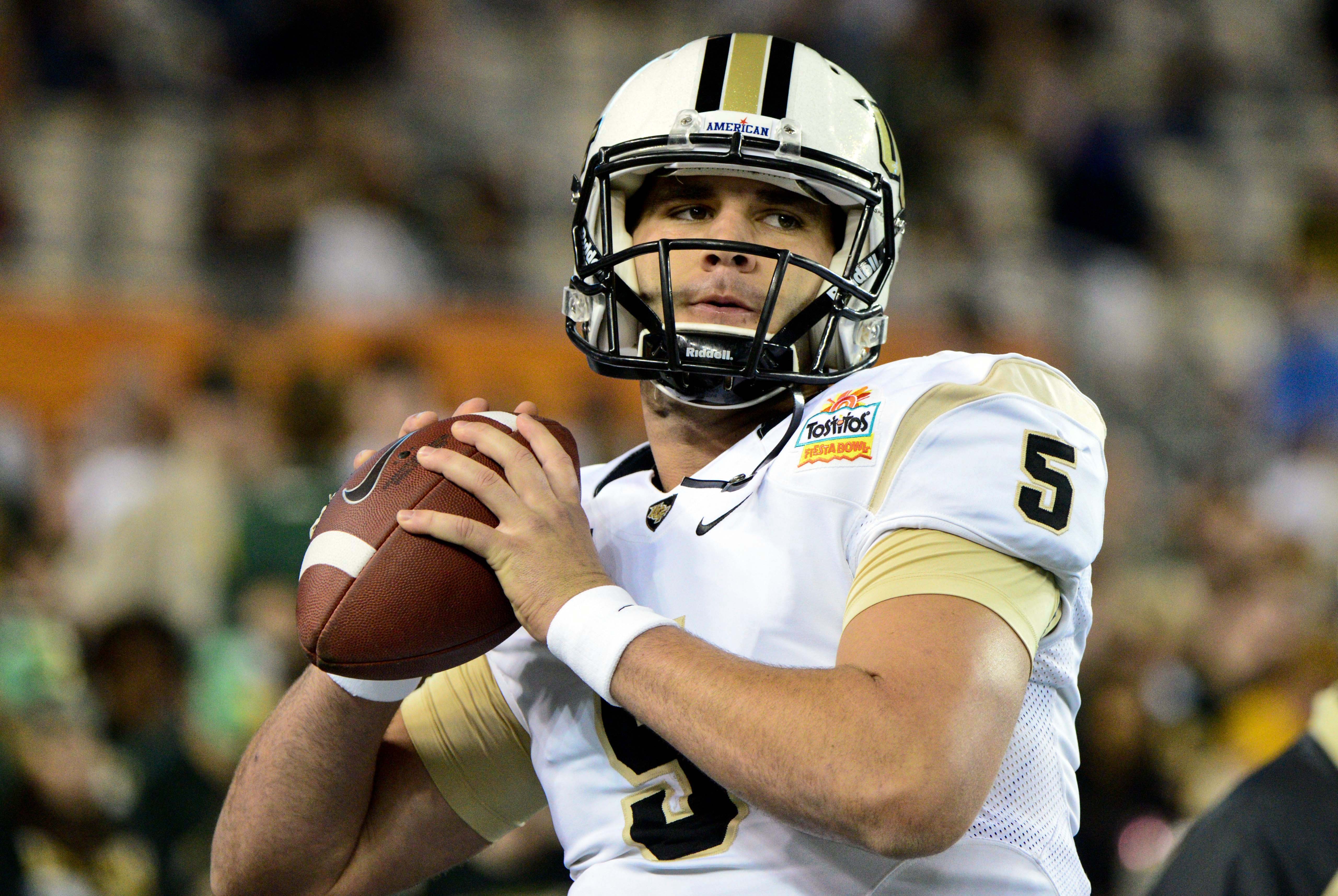 Jan 1, 2014; Glendale, AZ, USA; UCF Knights quarterback Blake Bortles (5) warms up prior to the game against the Baylor Bears at University of Phoenix Stadium During the Fiesta Bowl. Mandatory Credit: Matt Kartozian-USA TODAY Sports