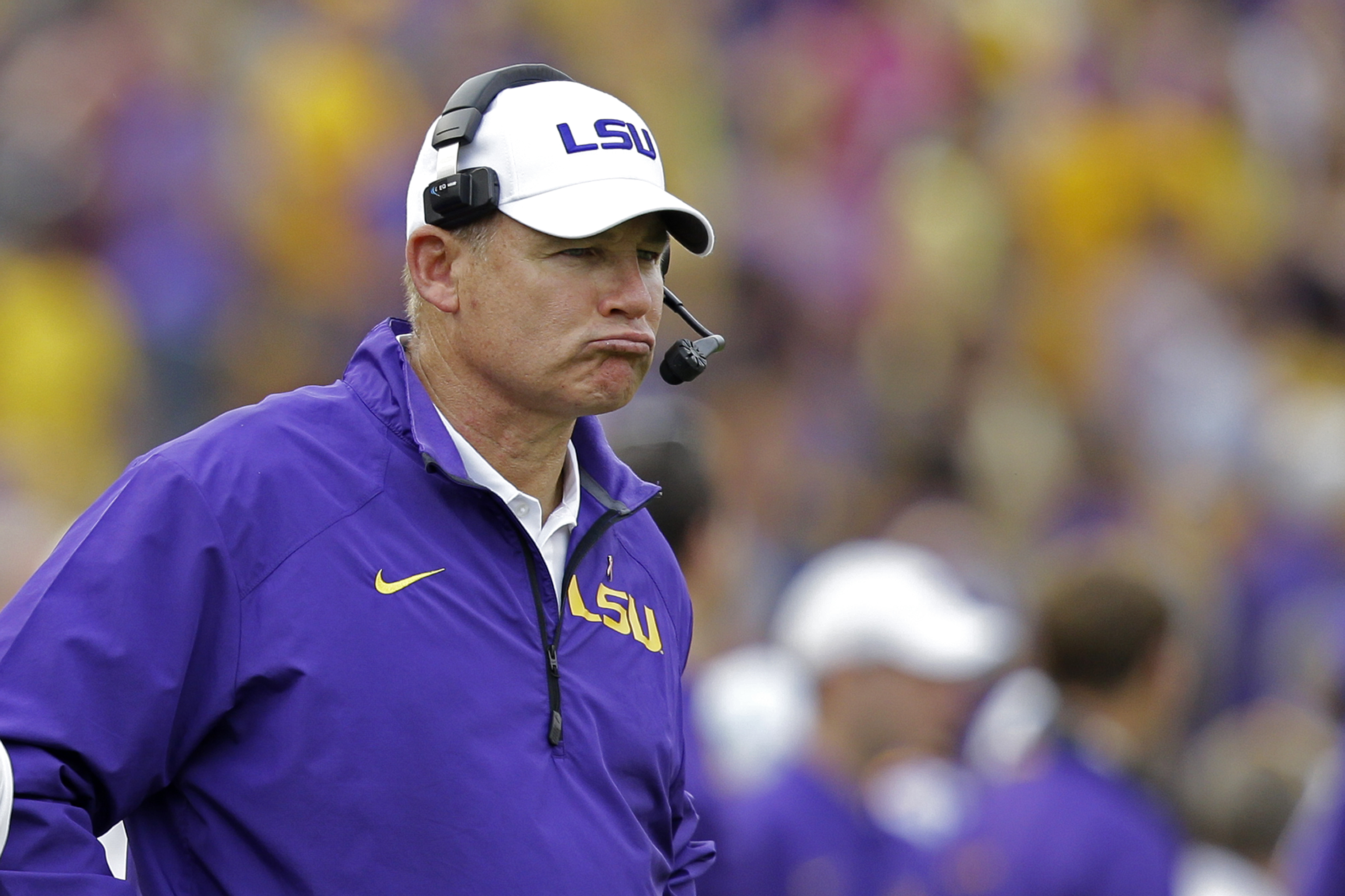 LSU head coach Les Miles watches from the sideline in the second half of an NCAA college football game against Florida in Baton Rouge, La., Saturday, Oct. 12, 2013.  LSU won 17-6. (AP Photo/Gerald Herbert)