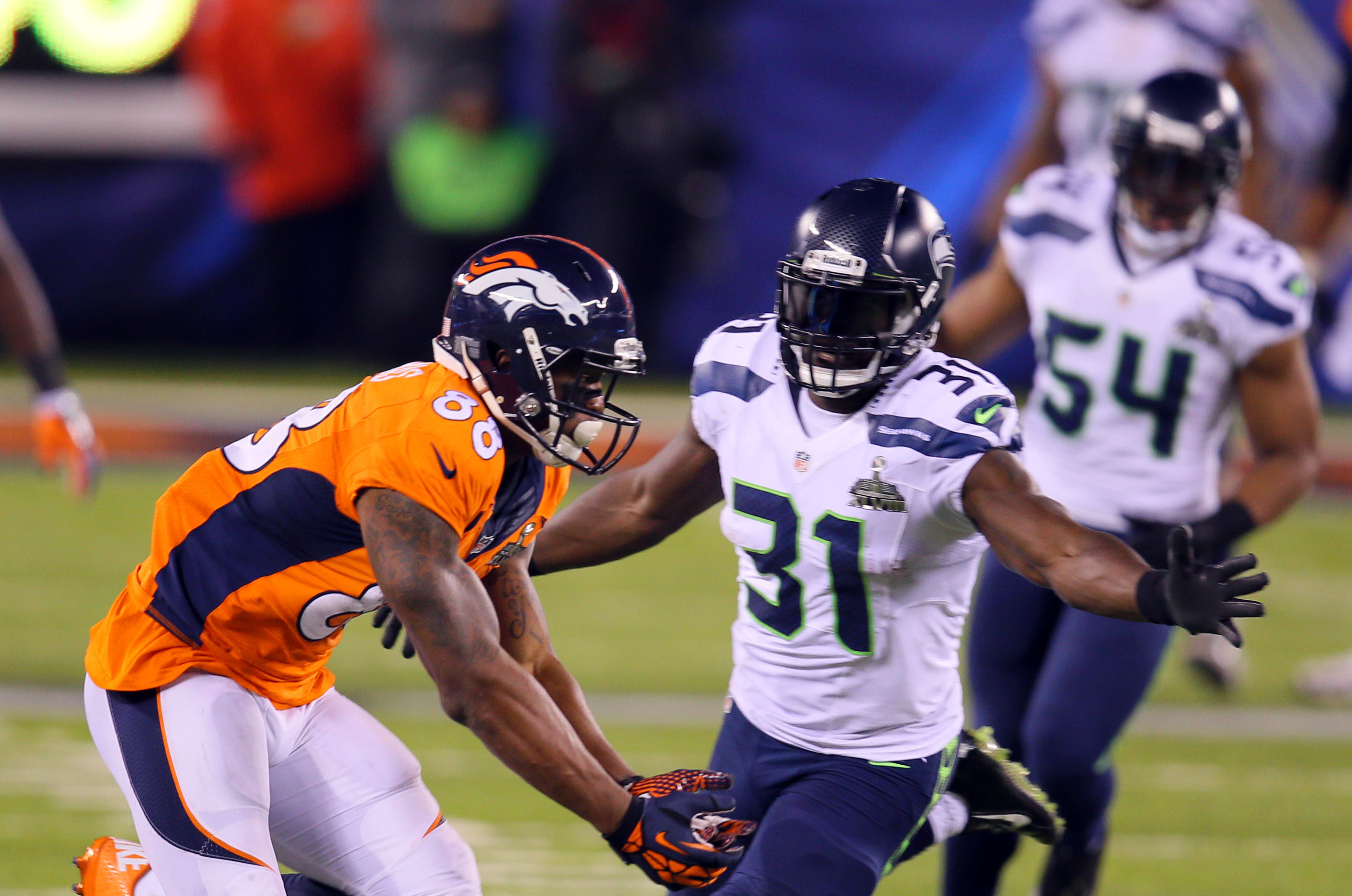 Feb 2, 2014; East Rutherford, NJ, USA; Denver Broncos wide receiver Demaryius Thomas (88) misses a pass against Seattle Seahawks strong safety Kam Chancellor (31) during the second half in Super Bowl XLVIII at MetLife Stadium.  Mandatory Credit: Adam Hunger-USA TODAY Sports
