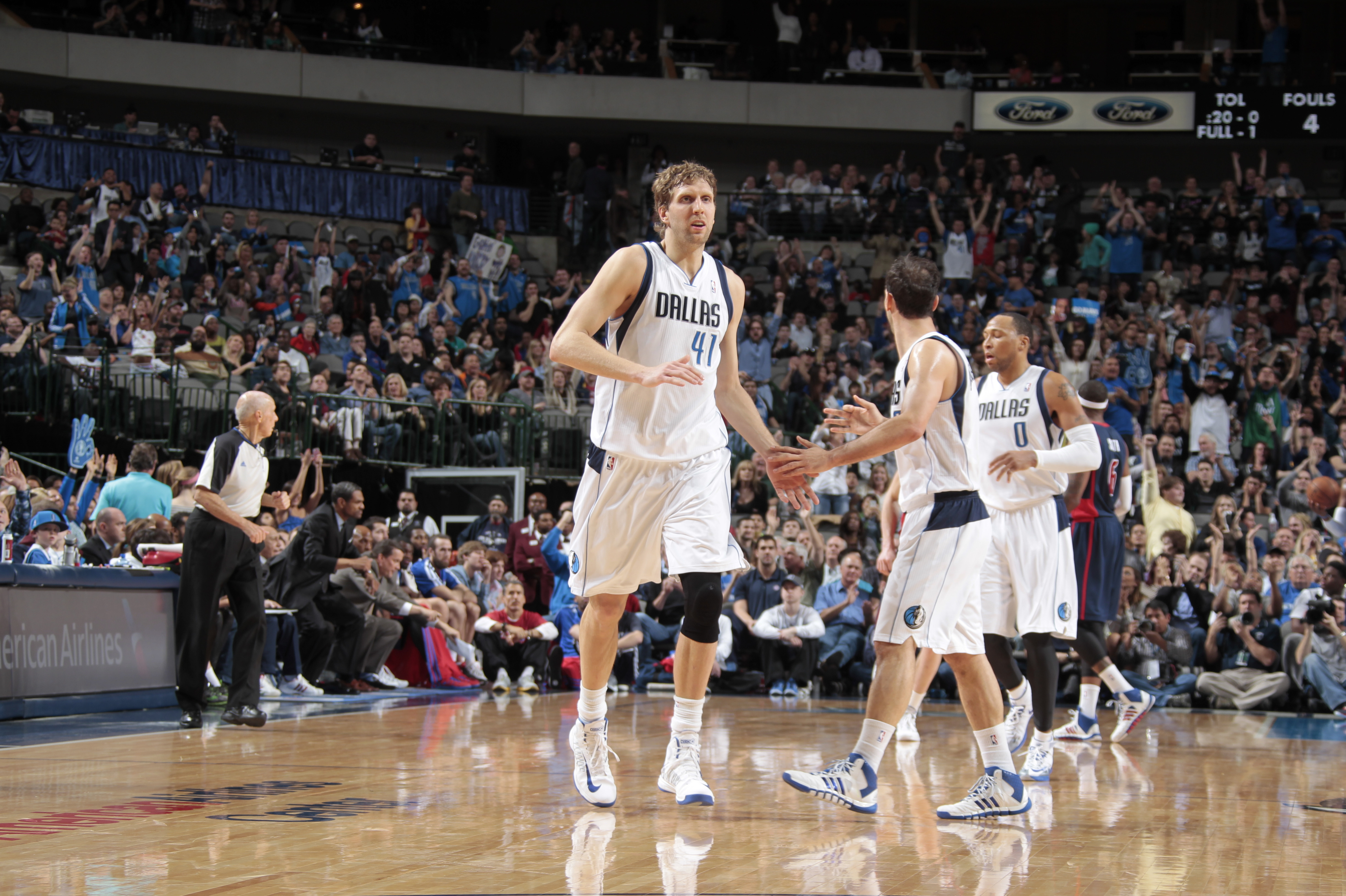 DALLAS, TX - JANUARY 26: Dirk Nowitzki #41 of the Dallas Mavericks celebrates hitting a shot with teammate Jose Calderon #8 against the Detroit Pistons on January 26, 2014 at the American Airlines Center in Dallas, Texas. NOTE TO USER: User expressly acknowledges and agrees that, by downloading and or using this photograph, User is consenting to the terms and conditions of the Getty Images License Agreement. Mandatory Copyright Notice: Copyright 2014 NBAE (Photo by Danny Bollinger/NBAE via Getty Images)