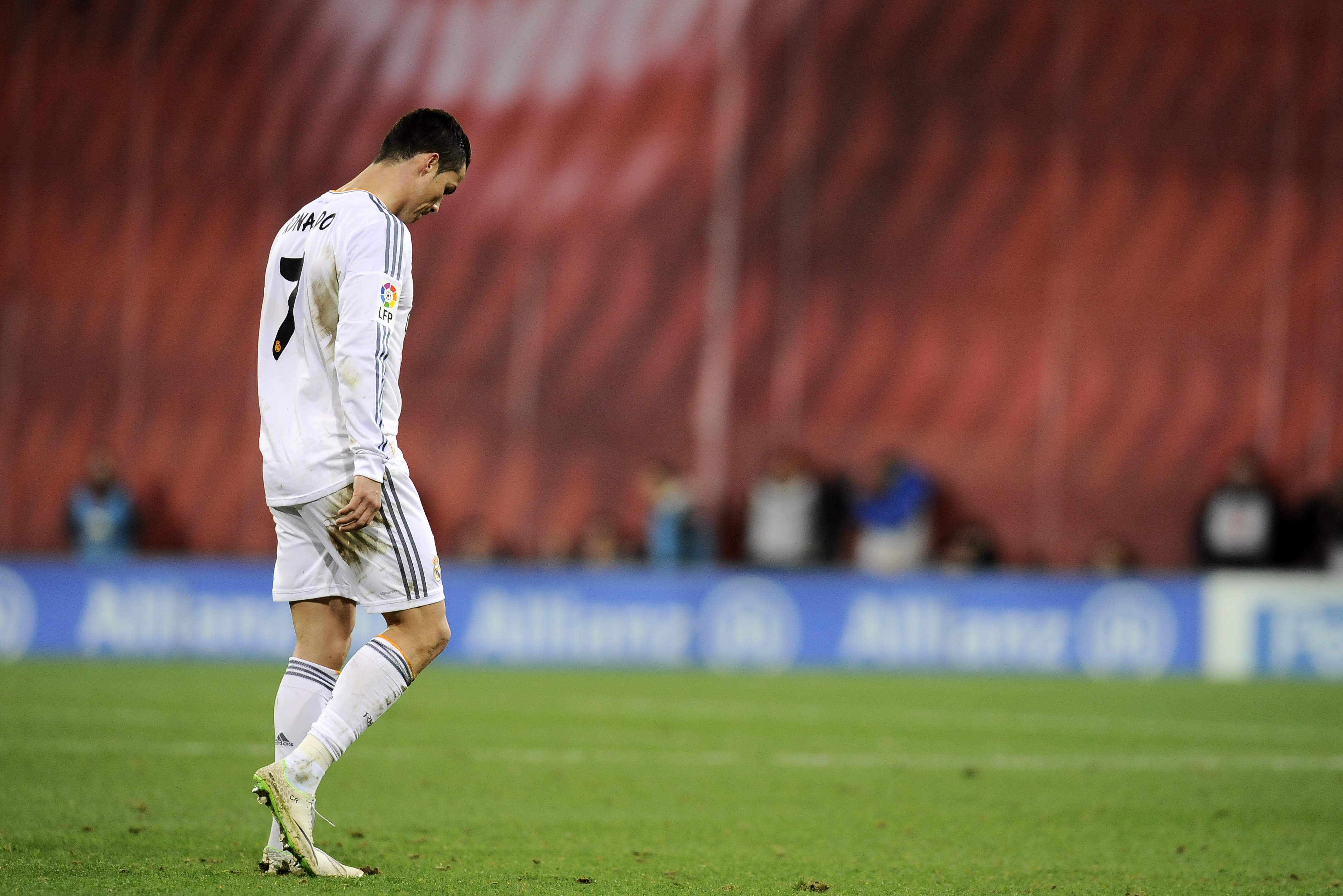 Real Madrid's Cristiano Ronaldo of Portugal, leaves the pitch after receiving a direct red card, during their Spanish League soccer match against Athletic Bilbao, at San Mames stadium in Bilbao, Spain, Sunday, Feb. 2, 2014.  (AP Photo/Alvaro Barrientos)