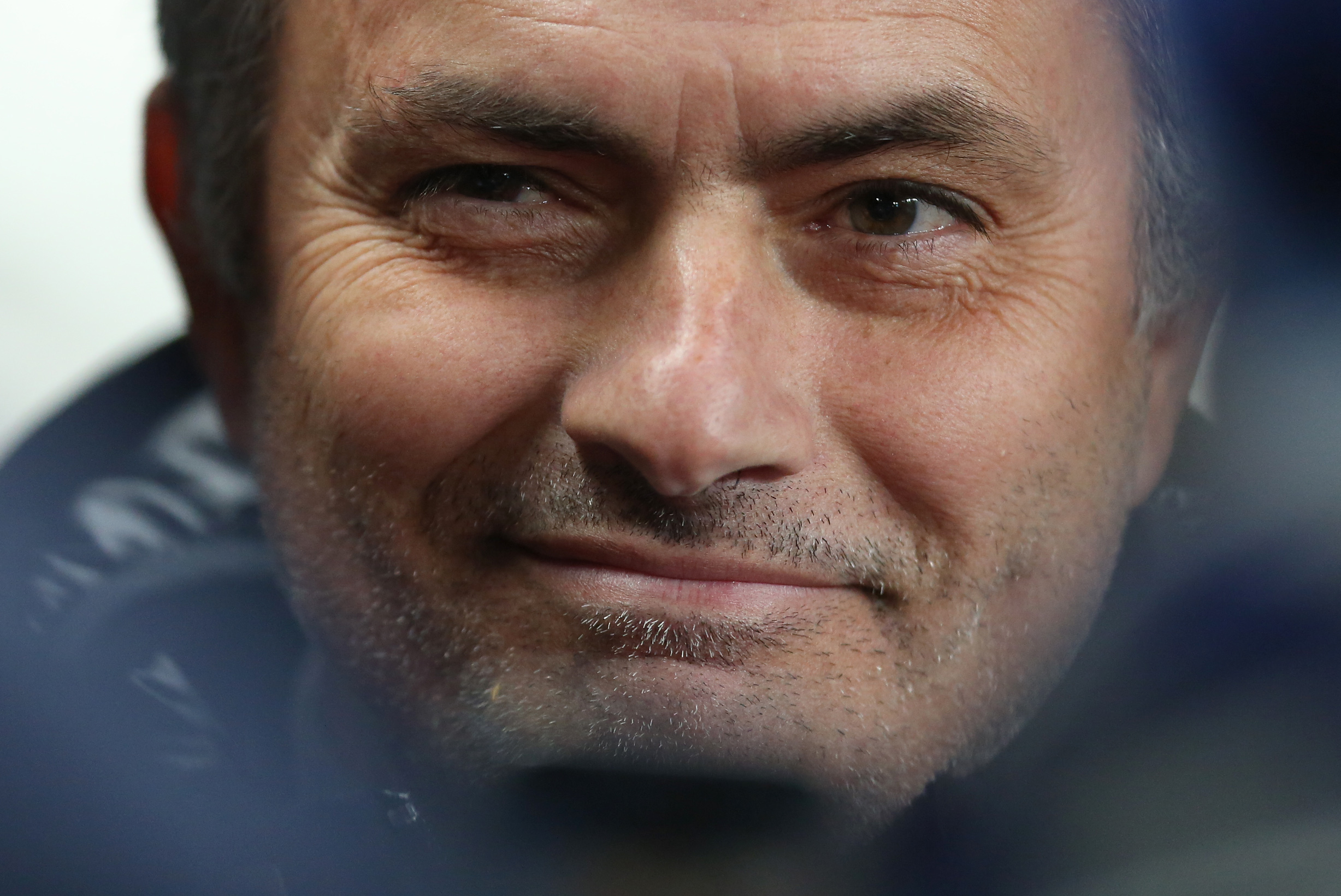 Chelsea's manager Jose Mourinho smiles as he waits for the English Premier League soccer match between Manchester City and Chelsea at the Etihad Stadium, Manchester, England, Monday, Feb. 3, 2014. (AP Photo/Jon Super)
