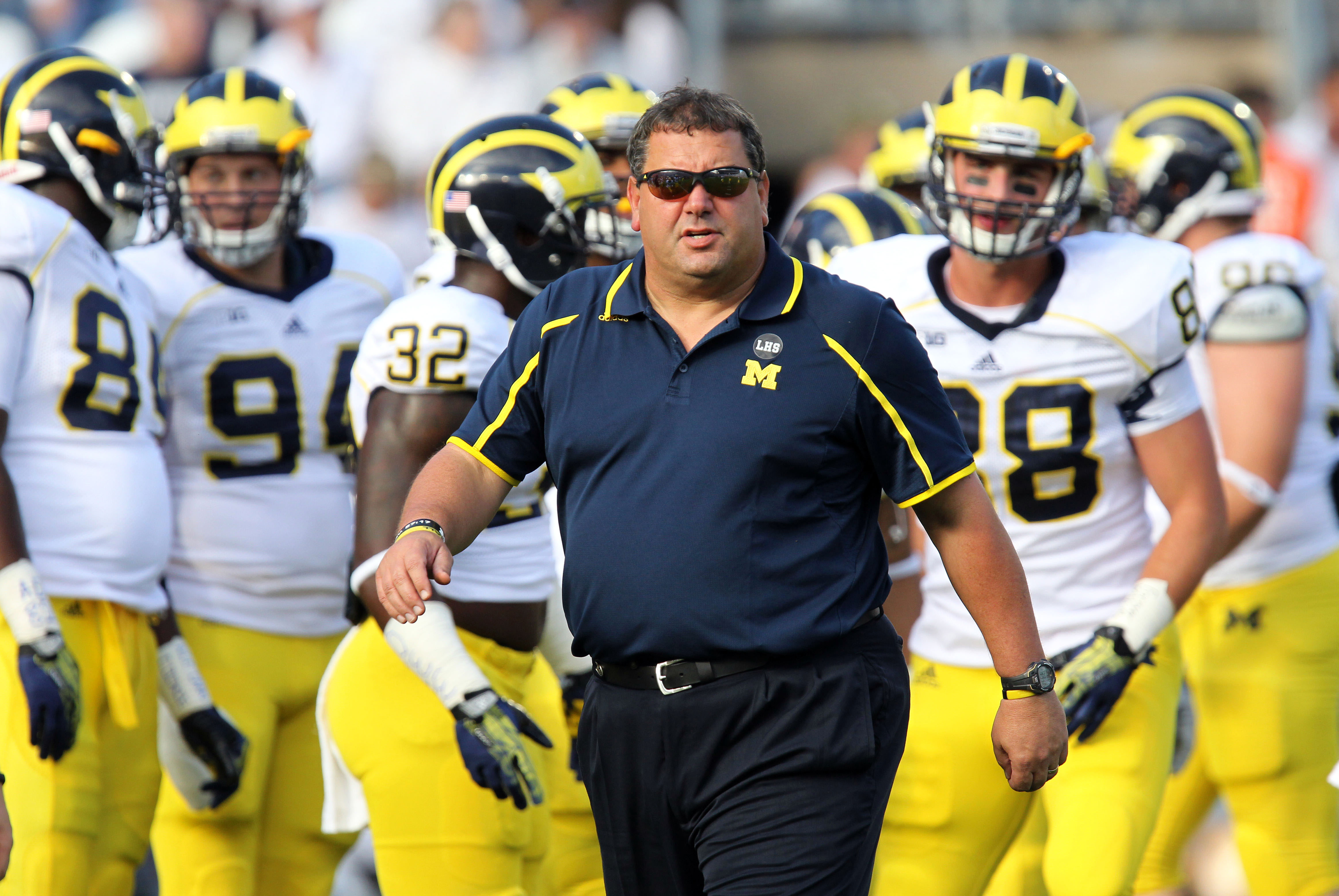 Oct 12, 2013; University Park, PA, USA; Michigan Wolverines head coach Brady Hoke walks the field during warmups prior to the game against the Penn State Nittany Lions at Beaver Stadium. Mandatory Credit: Matthew O'Haren-USA TODAY Sports