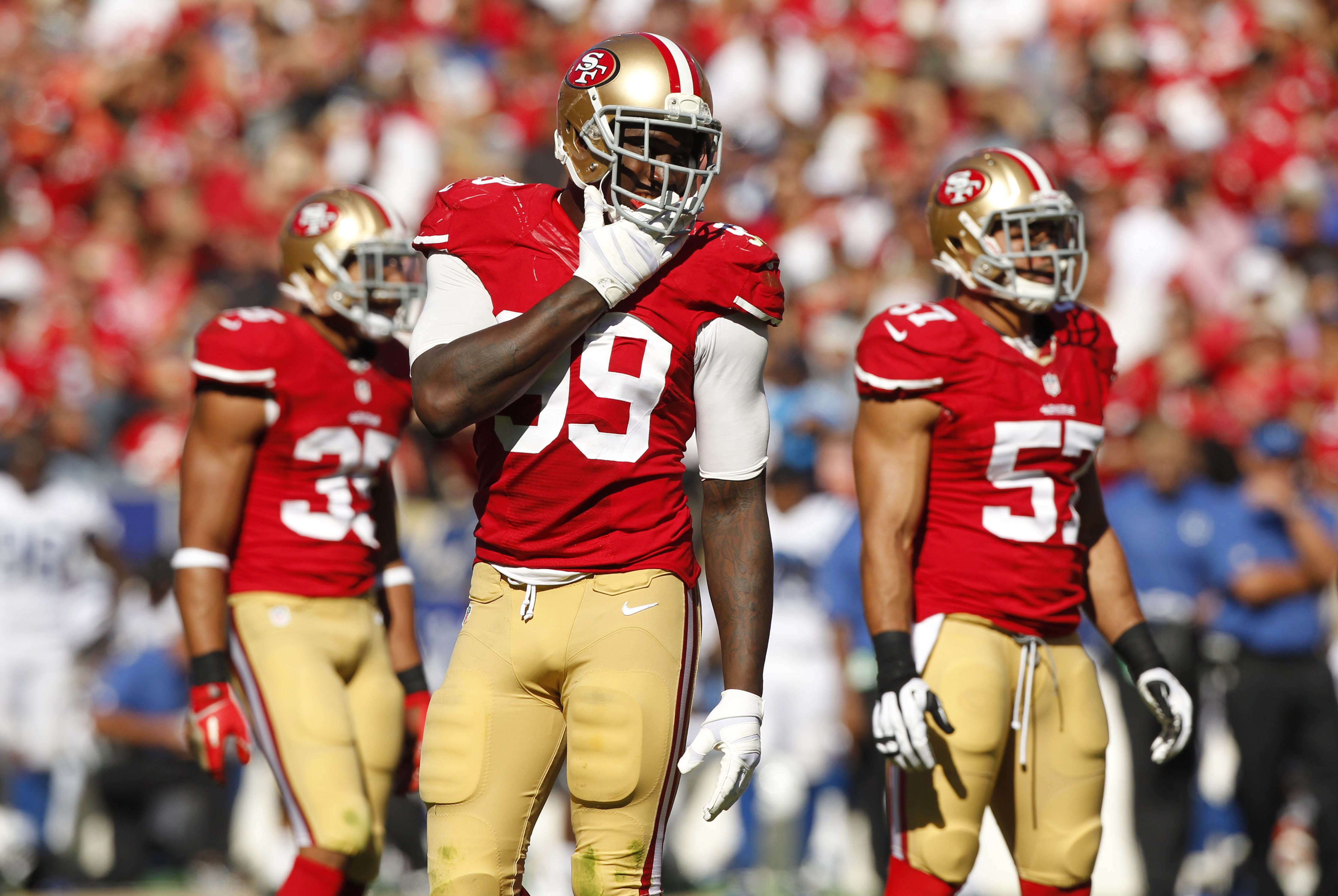 Sep 22, 2013; San Francisco, CA, USA; San Francisco 49ers outside linebacker Aldon Smith (99) stands on the field during a break in the action against the Indianapolis Colts in the fourth quarter at Candlestick Park. The Colts defeated the 49ers 27-7. Mandatory Credit: Cary Edmondson-USA TODAY Sports