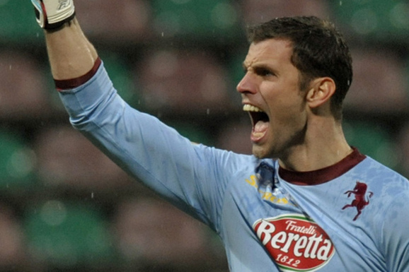 Torino's Daniele Padelli celebrates after his teammate Matteo Brighi scored a goal during their Serie A soccer match against Sassuolo, at Reggio Emilia's Mapei stadium, Italy, Sunday, Jan. 19, 2014. (AP Photo/Marco Vasini)