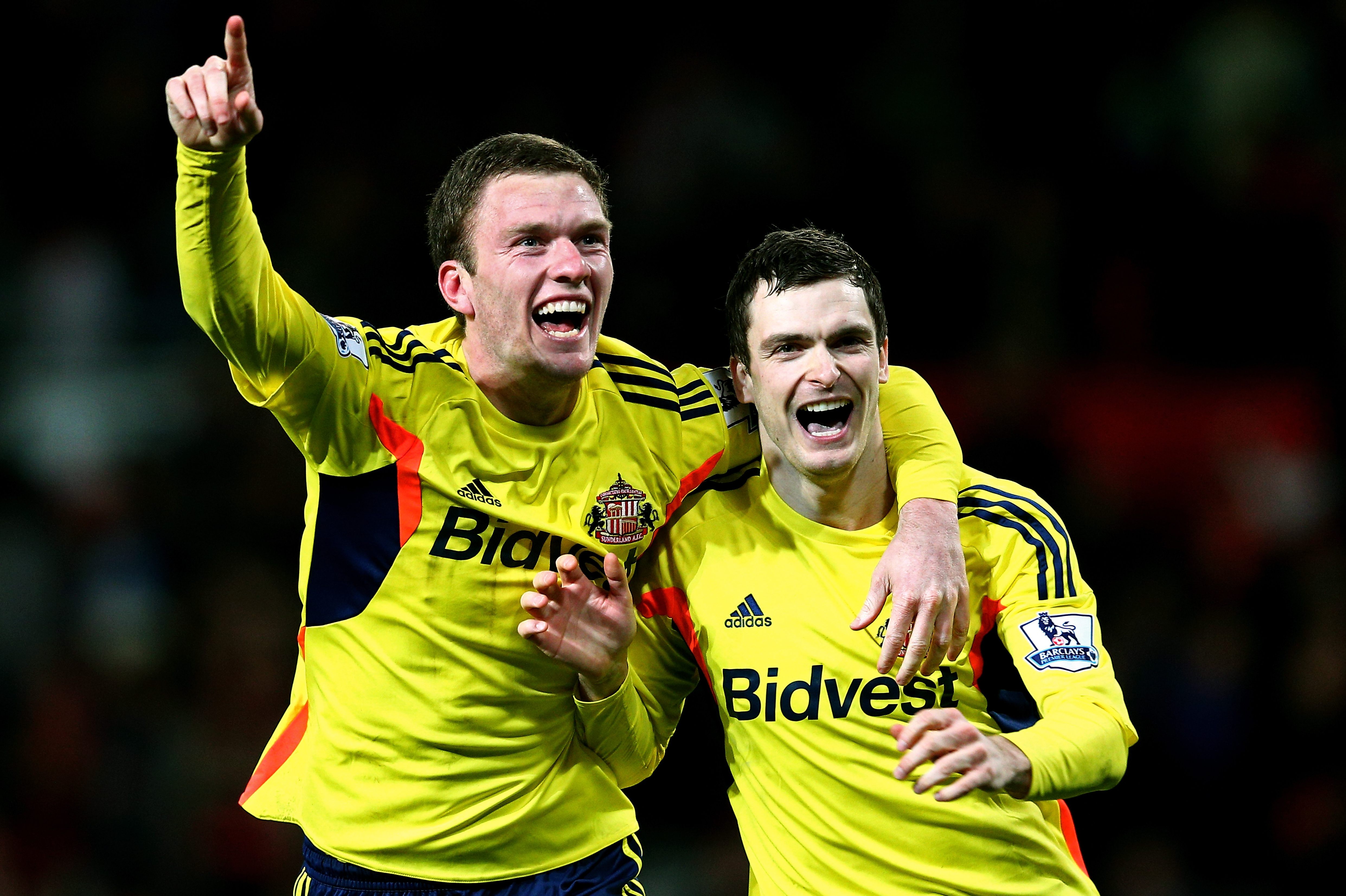 MANCHESTER, ENGLAND - JANUARY 22:  (L-R) Craig Gardner and Adam Johnson of Sunderland celebrate following their team's 2-1 victory in the penalty shootout during the Capital One Cup semi final, second leg match between Manchester United and Sunderland at Old Trafford on January 22, 2014 in Manchester, England.  (Photo by Clive Mason/Getty Images)