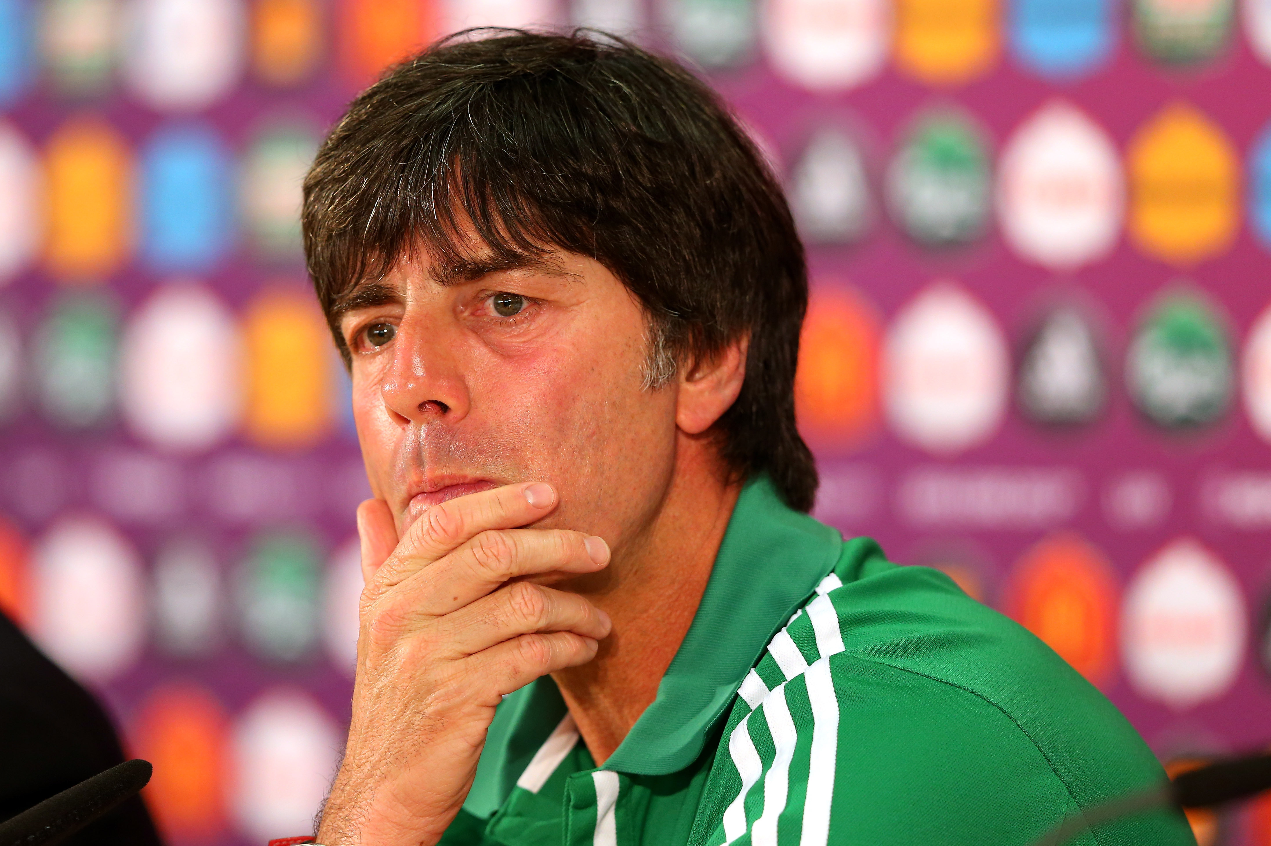 L'VIV, UKRAINE - JUNE 08:  In this handout image provided by UEFA, Joachim Low the coach of Germany talks to the media during a UEFA EURO 2012 press conference at the Arena Lviv on June 8, 2012 in Lviv, Ukraine.  (Photo by Handout/UEFA via Getty Images)