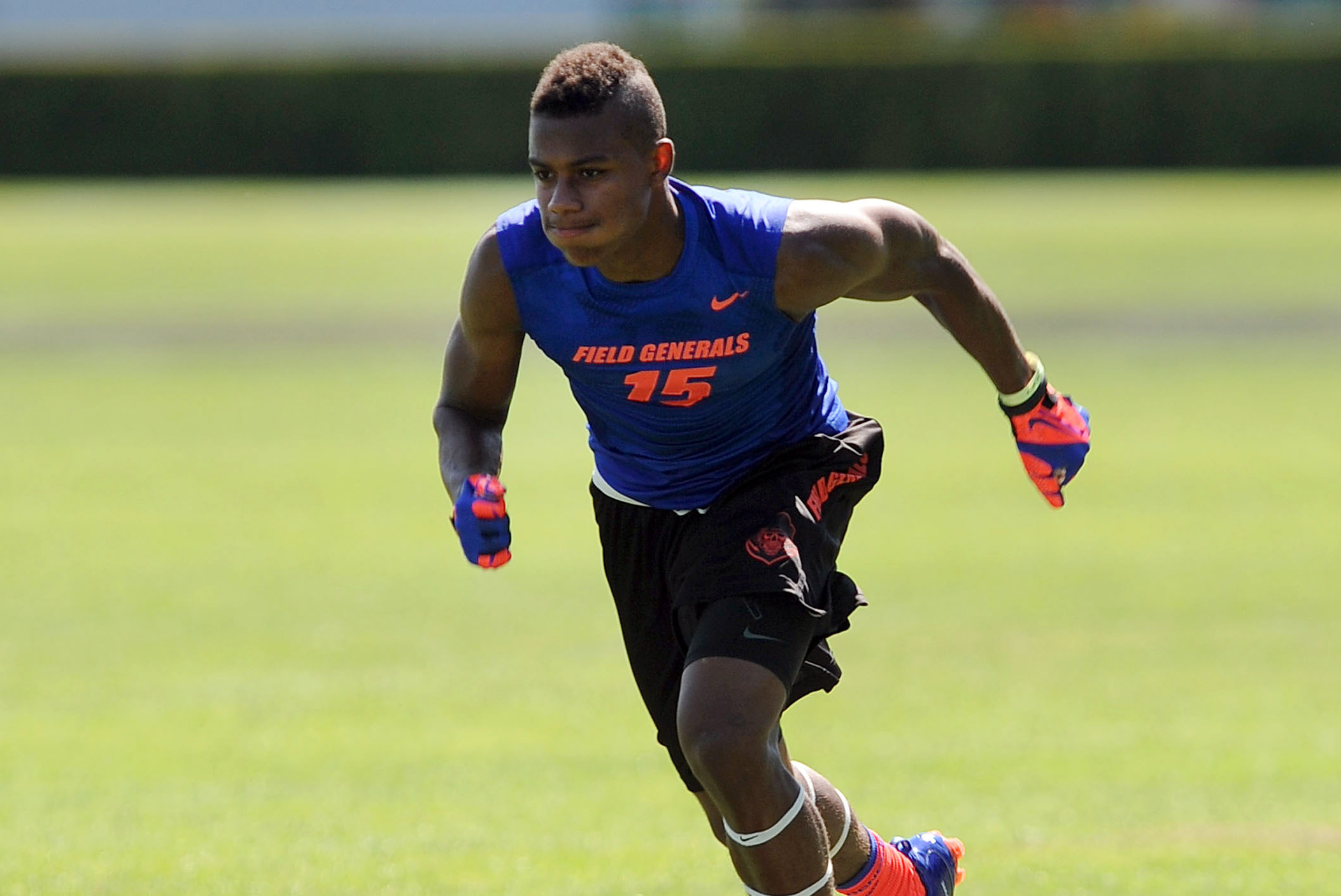 Jul 2, 2013; Beaverton, OR, USA; Wide receiver Malachi Dupre (15) runs a pass route during the Nike 7on7 pool play at Nike World Headquarters in Beaverton, Oregon on Tuesday July, 2, 2013. Mandatory Credit: Steve Dykes-USA TODAY Sports