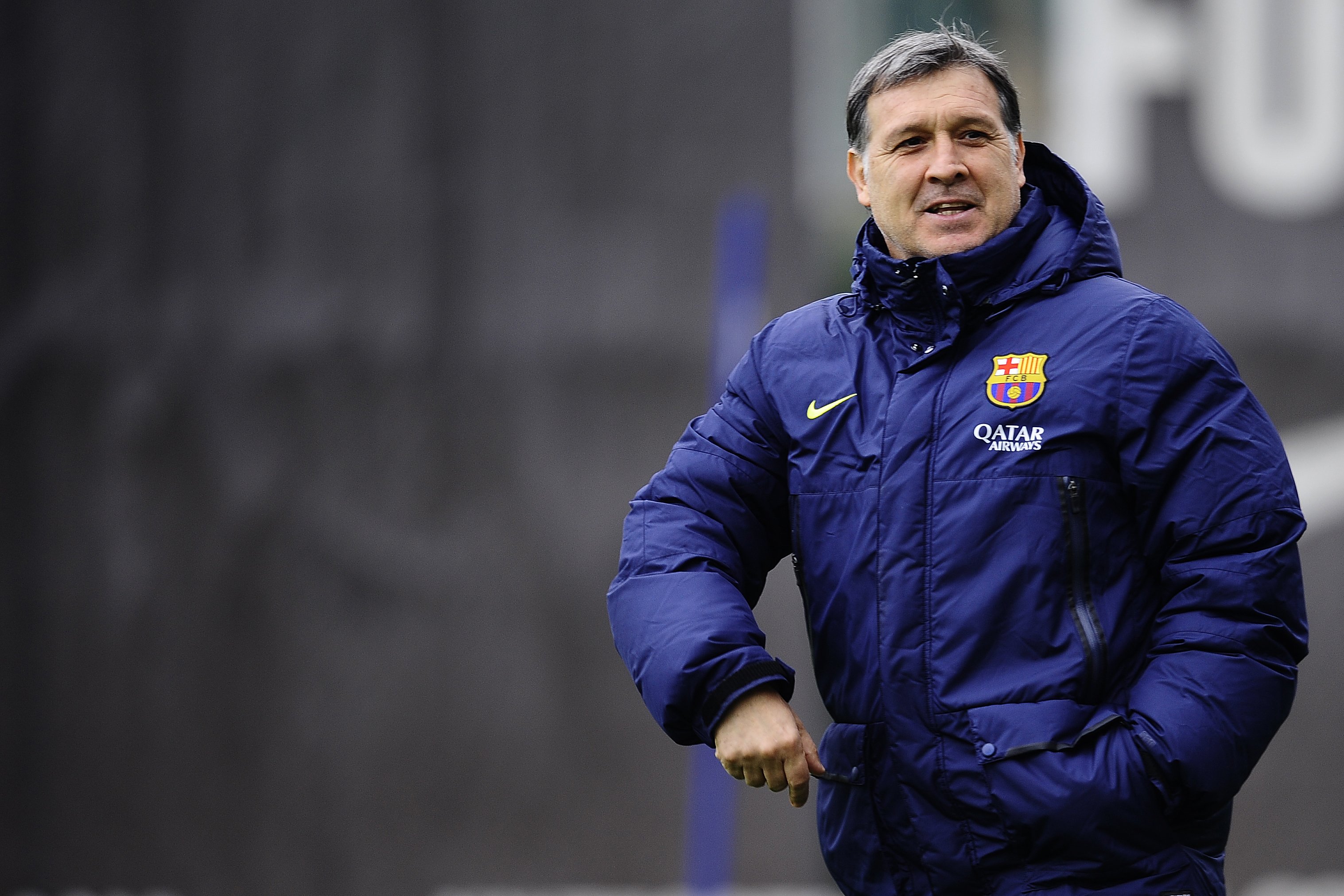 FC Barcelona's coach Gerardo Martino Tata attends a training session at the Sports Center FC Barcelona Joan Gamper in San Joan Despi, Spain, Saturday, Jan. 18, 2014. (AP Photo/Manu Fernandez)
