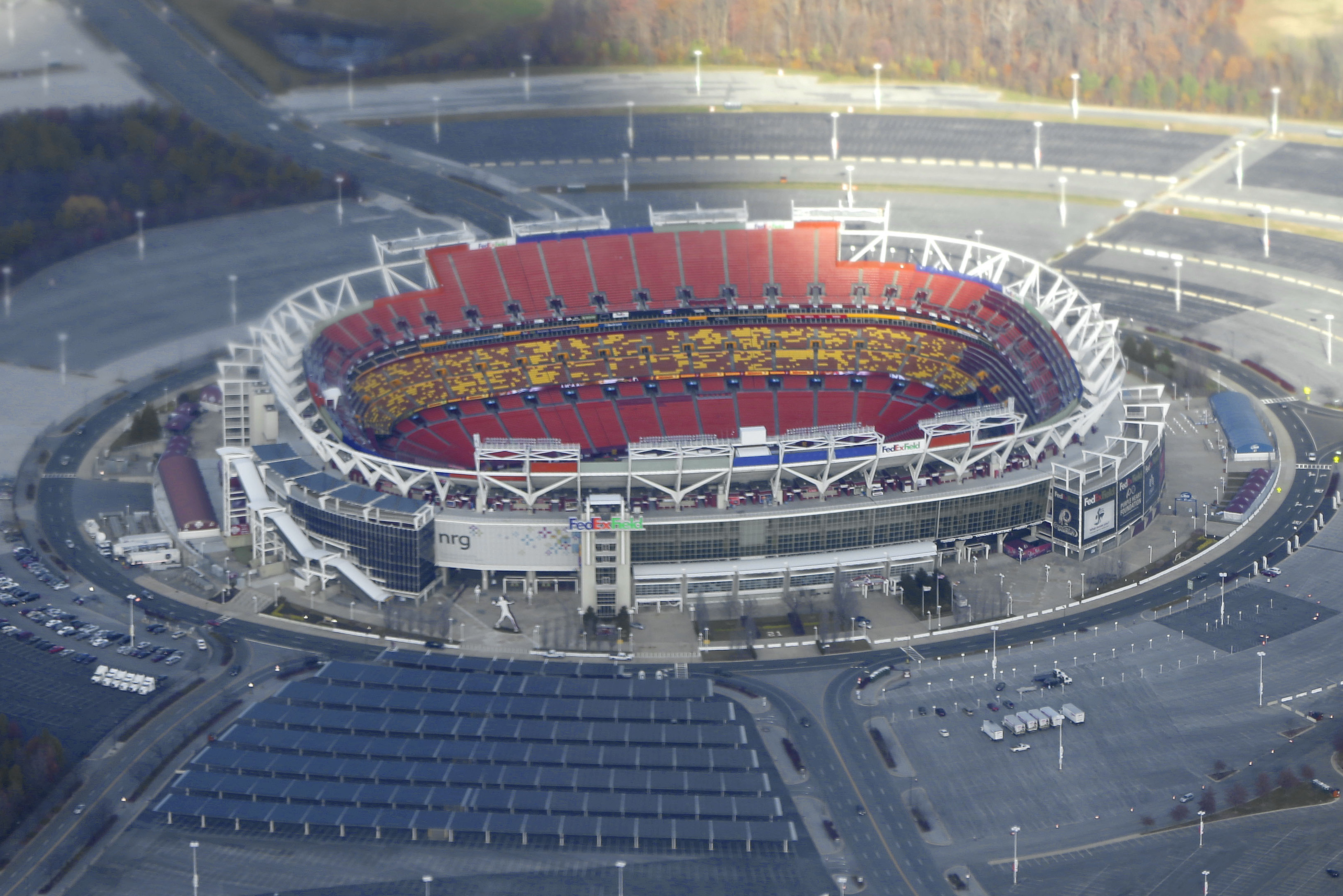 Fedex Field, home of the NFL Washington Redskins in Landover, Md., is seen from Air Force One, with President Barack Obama aboard, Sunday, Nov. 24, 2013. Obama is traveling on a three day West Coast swing to Seattle, San Francisco and Los Angeles that will feature a bit of official business but mostly fundraising for the Democratic party.  (AP Photo/Pablo Martinez Monsivais)