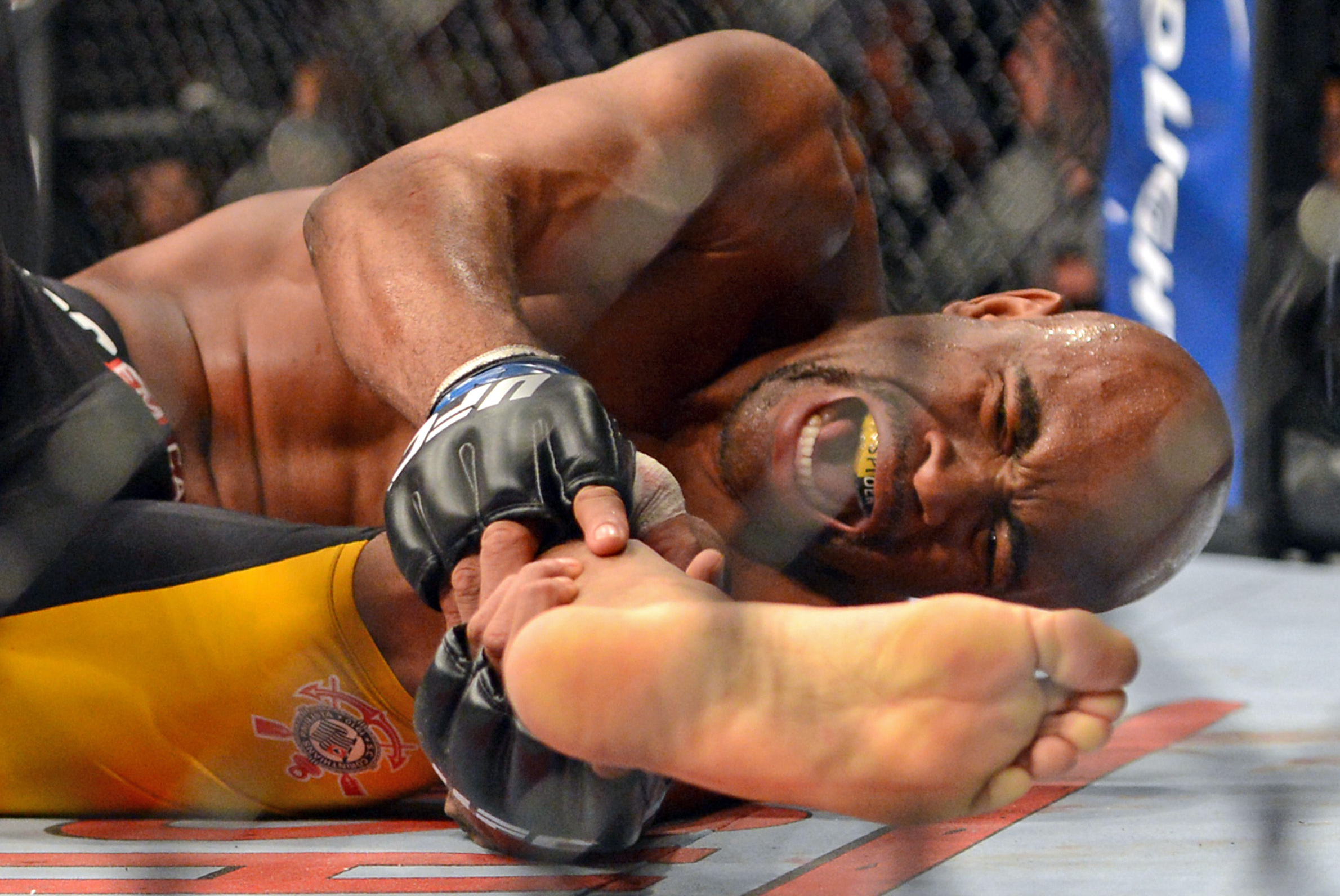 Dec 28, 2013; Las Vegas, NV, USA;    Anderson Silva reacts after breaking his leg on a kick to Chris Weidman (not pictured) during their UFC middleweight championship bout at the MGM Grand Garden Arena. Mandatory Credit: Jayne Kamin-Oncea-USA TODAY Sports