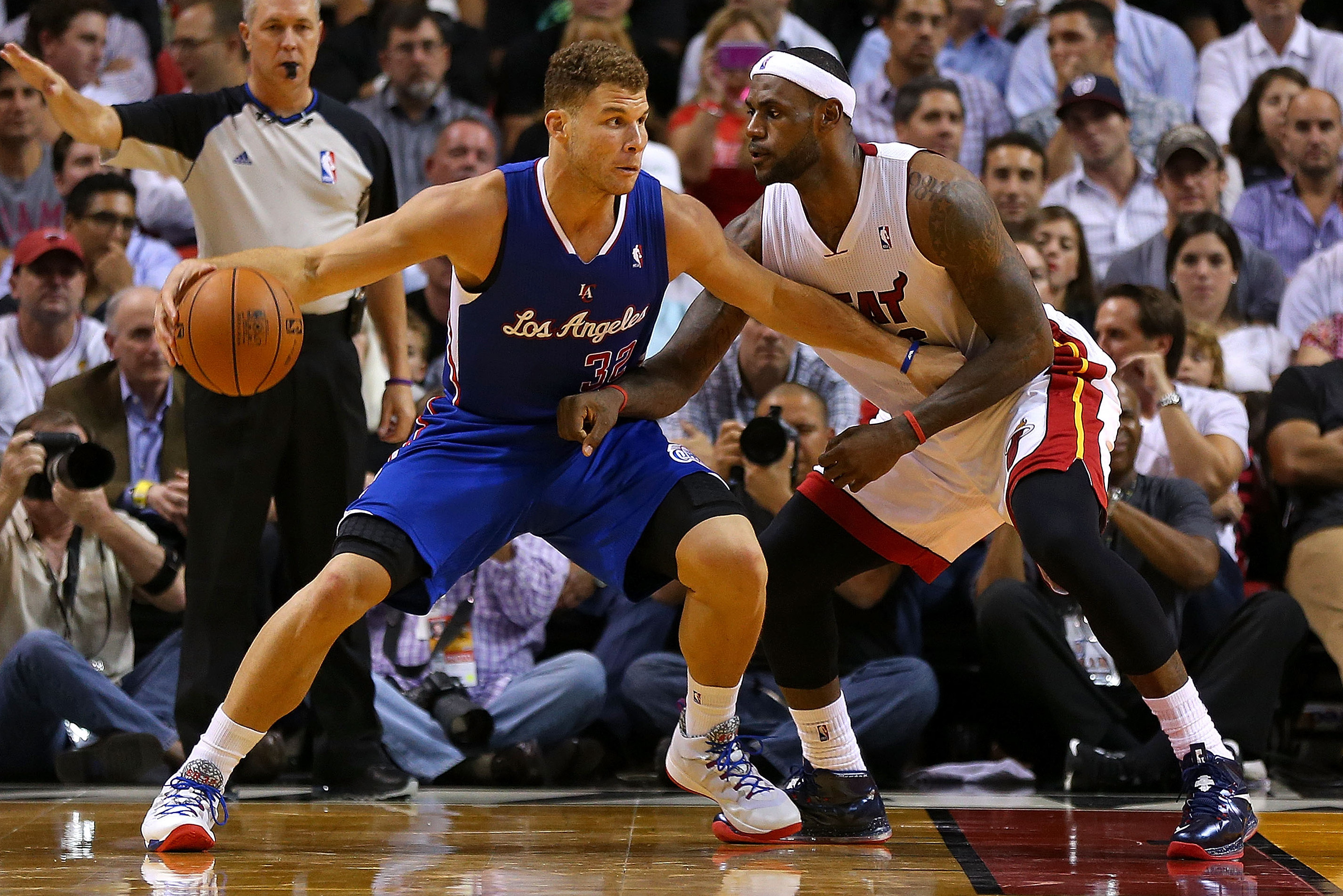 MIAMI, FL - NOVEMBER 07:  LeBron James #6 of the Miami Heat guards Blake Griffin #32 of the Los Angeles Clippers during a game  at AmericanAirlines Arena on November 7, 2013 in Miami, Florida. NOTE TO USER: User expressly acknowledges and agrees that, by downloading and/or using this photograph, user is consenting to the terms and conditions of the Getty Images License Agreement. Mandatory copyright notice:  (Photo by Mike Ehrmann/Getty Images)