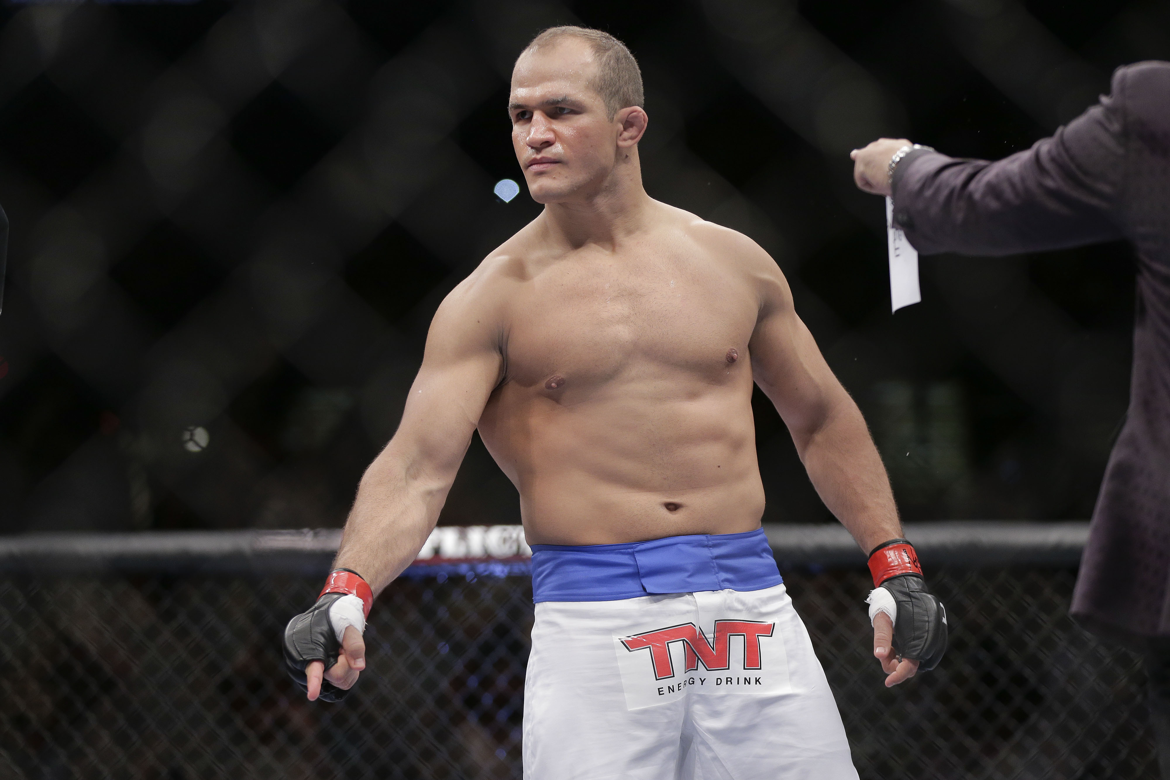 Junior Dos Santos motions to opponent Mark Hunt before fighting  in the UFC 160 mixed martial arts heavyweight bout, Saturday, May 25, 2013, in Las Vegas. (AP Photo/Julie Jacobson)