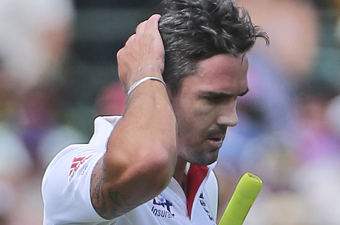 England cricket player Kevin Pietersen walks off the field after he was caught out for three runs during their Ashes cricket test match against Australia  in Sydney, Australia, Saturday, Jan. 4, 2014. (AP Photo/Rob Griffith)